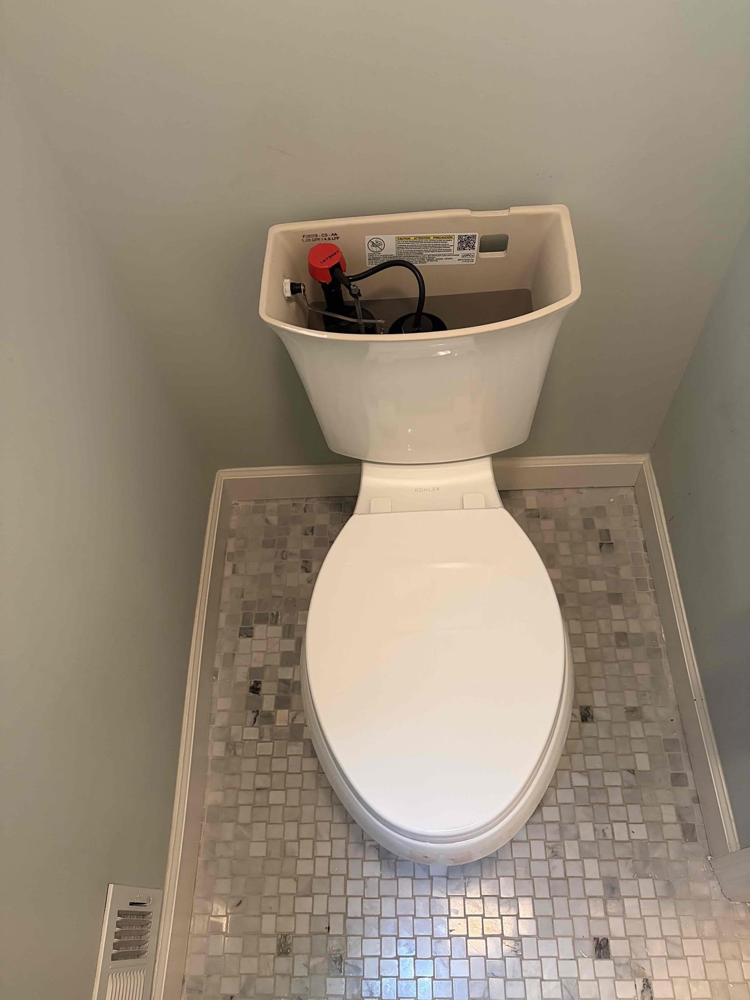 For this customer we removed and installed a new toilet in the master bathroom, we installed a kholer intrepid  2 piece toilet, removed the old wax ring and cleaned all the older caulking off and cleaned the surrounding area, once cleaned we installed the new wax ring, new closet bolts and. Cut them to length. Installed the base of toilet following the tank, to insure proper fitment. Once installed there are no leaks from the toilet. Went back with white caulk to finish the install. 