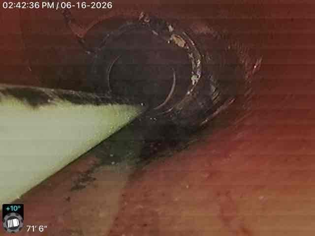 Customer out due to backup occurring in various fixtures throughout the home. After performing our initial evaluation, we determined that a sewer camera inspection was the best course of action to identify the source of the issue. Upon inspection, the sewer line was found to be obstructed. The customer elected, not to dig and install a clean out at this time to gain direct access to the sewer line. As an alternative, we assessed the system through the municipal sewer manhole and ran a camera upstream towards the residence. The inspection revealed significant roots within the sewer line, causing the blockage and restricting proper flow. We presented the customer with available repair options based on our findings. After reviewing these options, the customer approved hydro jetting service to clear the root intrusion and restore drainage to the system.
Was able to clear out line of root intrusion have before and after photos attached to email