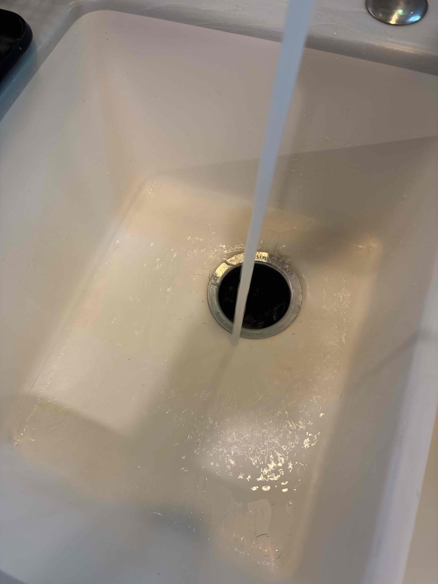 Unjam 5/8hp garbage disposal. Also adjusted toilet handle. Both garbage disposal and toilet handle are working properly at departure.
