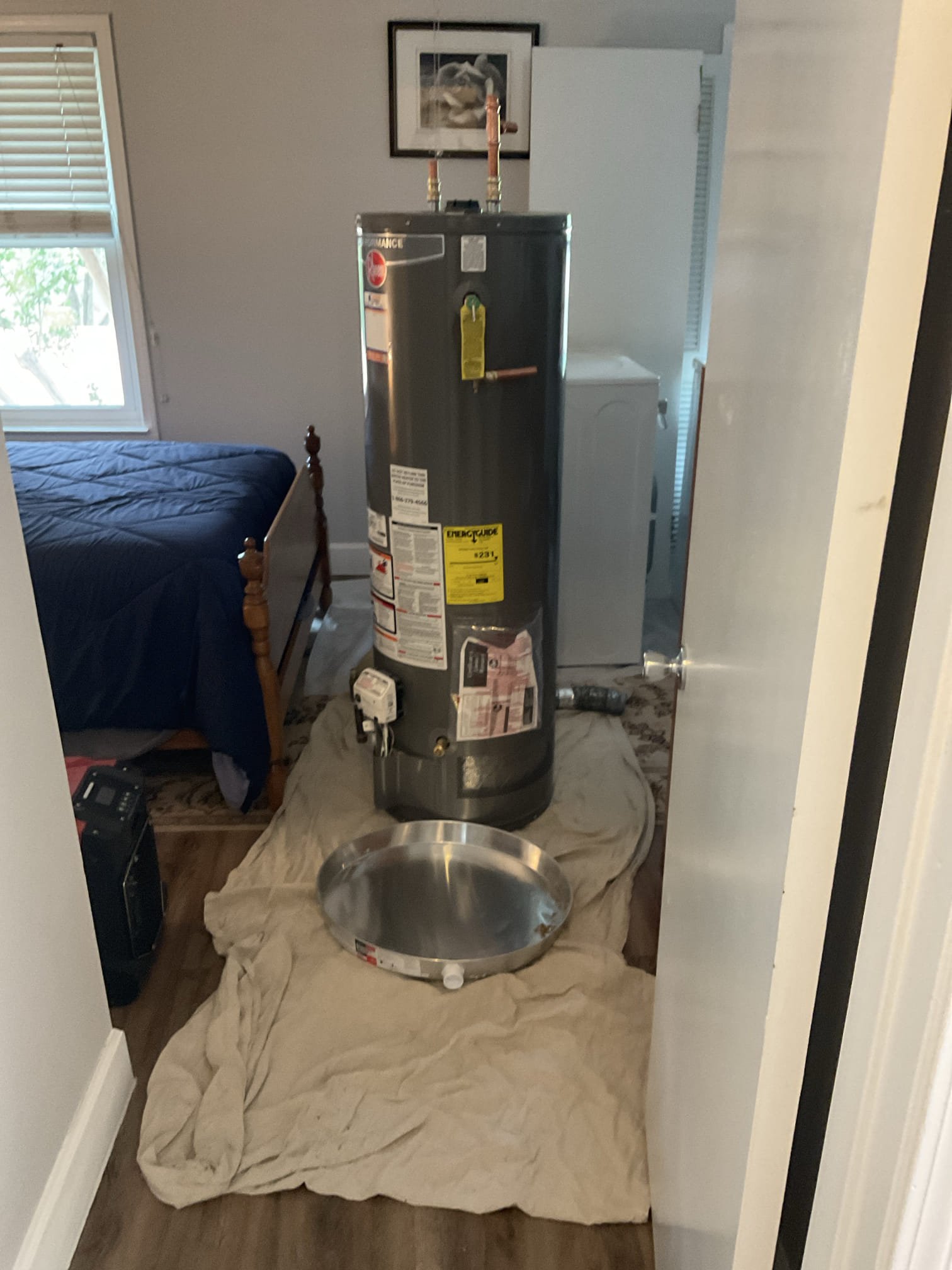 Two trips , disconnect and reconnect the existing water heater , installed back in same location 
