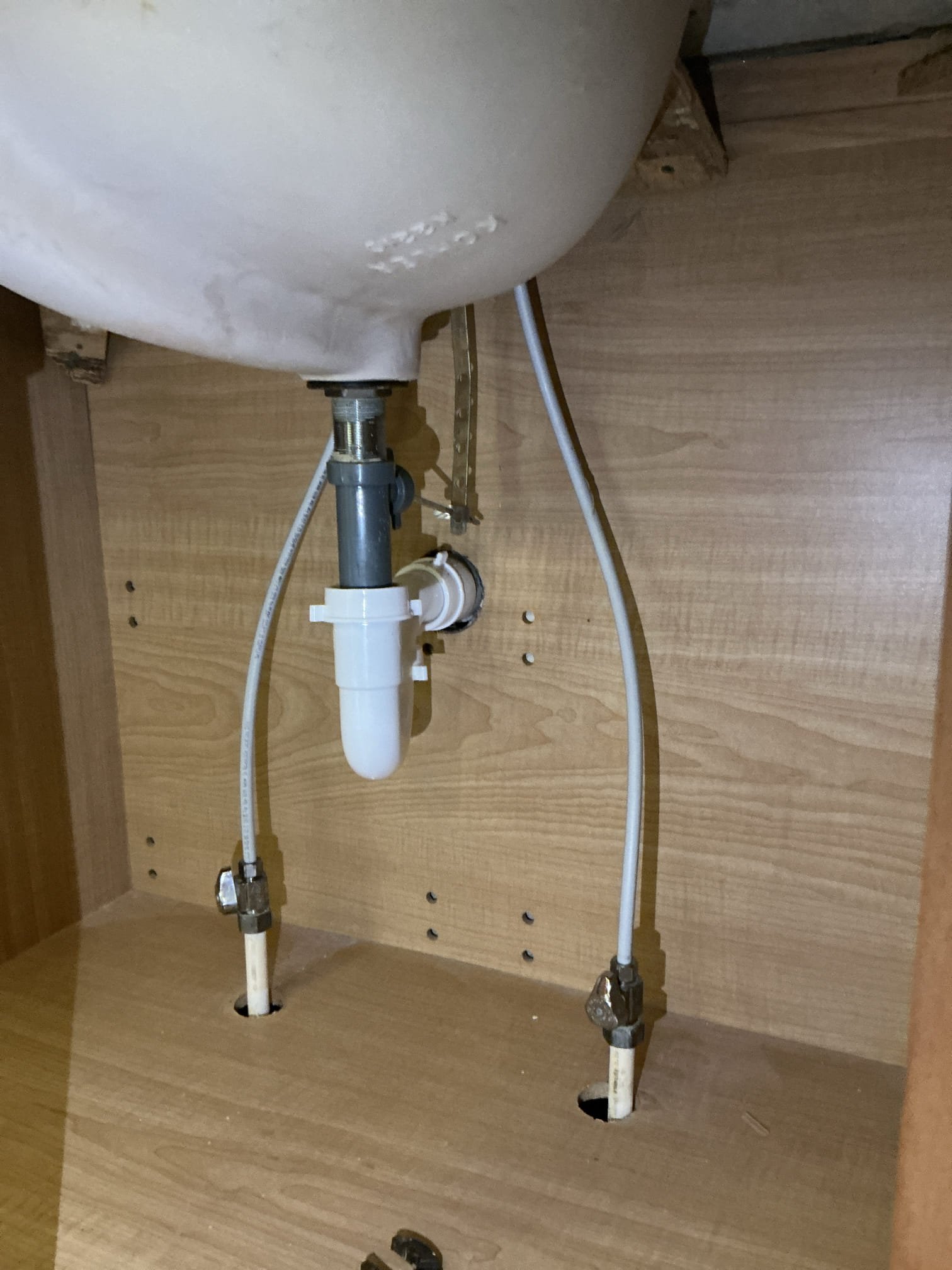 Diagnosed issue with lavatory faucet not working properly on left side in upstairs bedroom bathroom. Upon arrival Noticed faucet was not hooked up to water or drain. Took off caps on service stops and reinstalled supply lines and installed new p trap for lavatory faucet. Turned on faucet and tested thoroughly for proper operation. No leaks found after work completed and after testing.