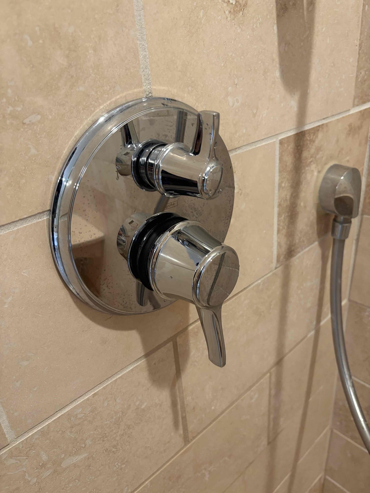 Replaced failed cartridge in walk in shower in back bathroom. Shower is no longer dripping and working properly at departure. Water pressure is current set at 60 psi.