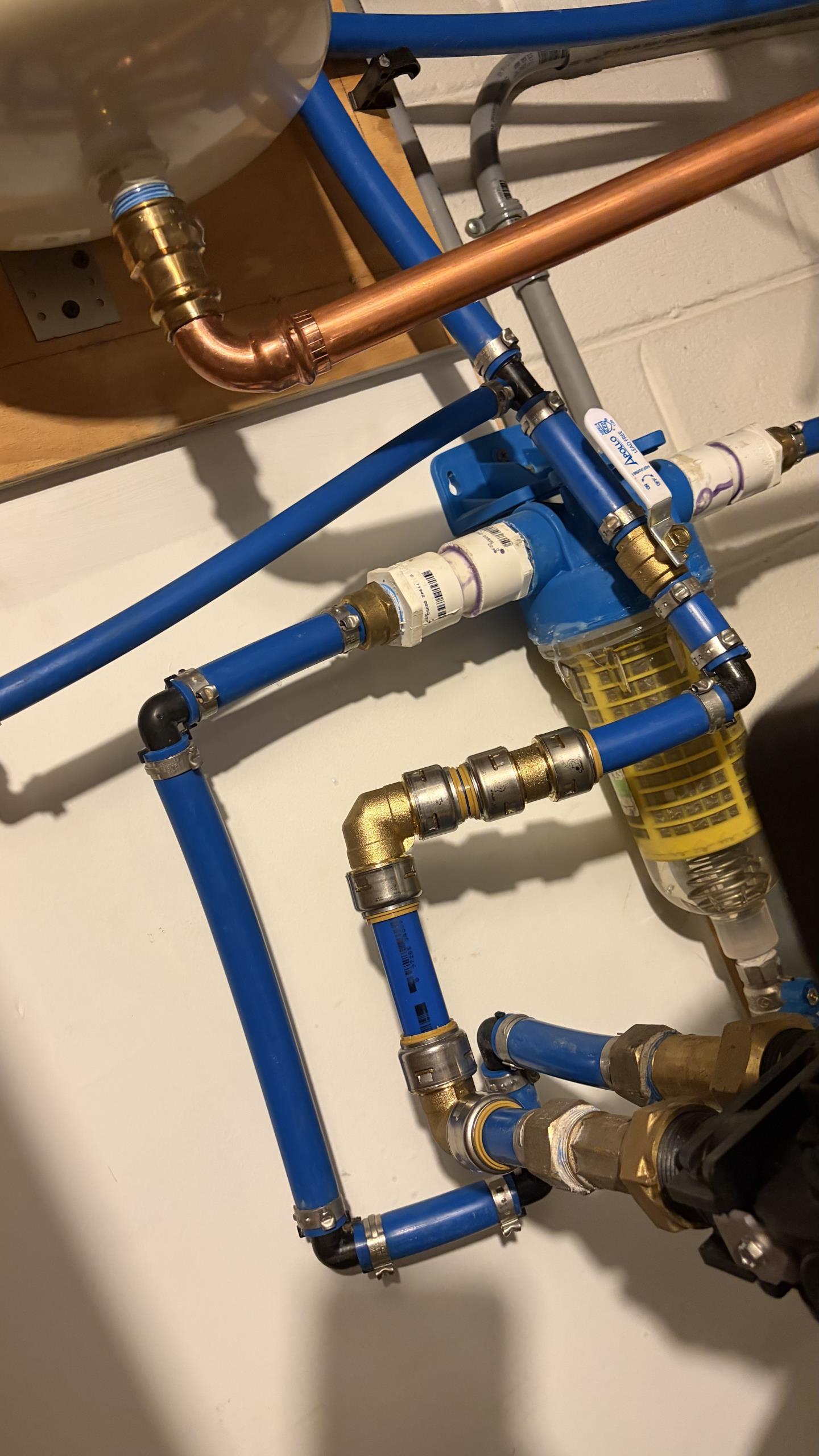 Replaced leaking in-line filter. Installed new filter with bypass valves. Also repiped section of main water line with copper piping. No leaks at departure.