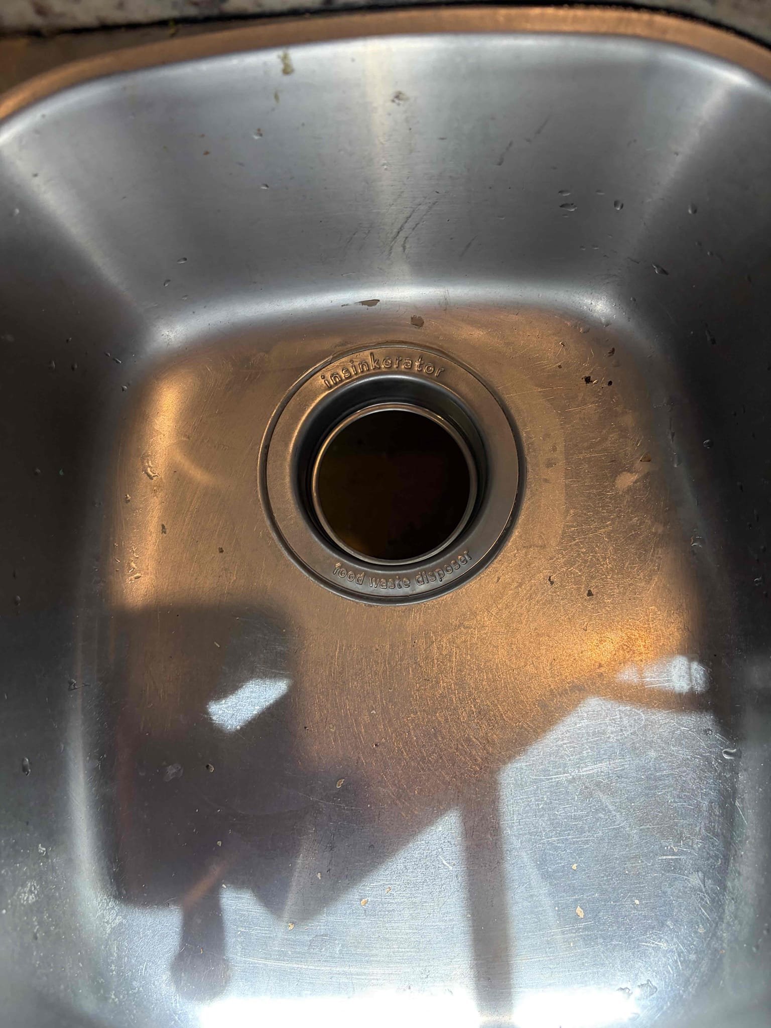 Is CUSTOMER we installed a brand new half horsepower garbage disposal in the kitchen. The previous garbage disposal was a three-quarter horsepower KitchenAid garbage disposal. It was an end of life, but more importantly the blades on the inside of the unit were rusted and removed so therefore it was not grinding the food out and flowing down the drain so I needed to be done was a new disposal to be installed the CUSTOMER two options of what we could put in CUSTOMER went with the half horsepower for the rental property. Once everything was installed. There were no leaks what was installed, though was the new bracket for the disposal with brand new putty and I’ll be necessary fittings associated with it to furthermore the new disposal, garbage disposal, keys left to the side in the new drain piece once everything was installed there are no leaks