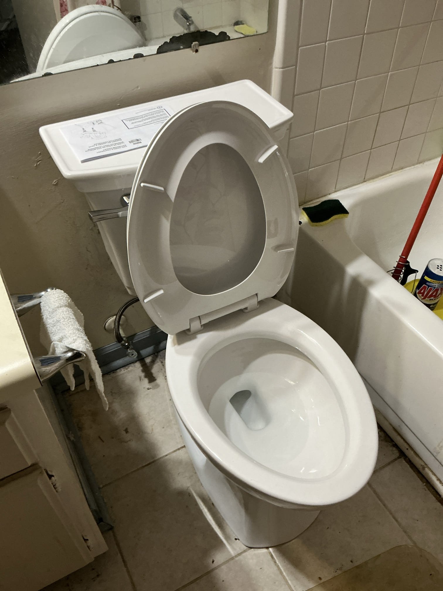 In upstairs bathroom shut off water to old toilet and lavatory faucet. Remove both fixtures. Provide and install new 2 piece toilet and lavatory faucet. Install new toilet with new wax ring, toilet bolts, and toilet supply line. Install new lavatory faucet and drain with new supply lines. Test all work for proper operation. Clean workspace 