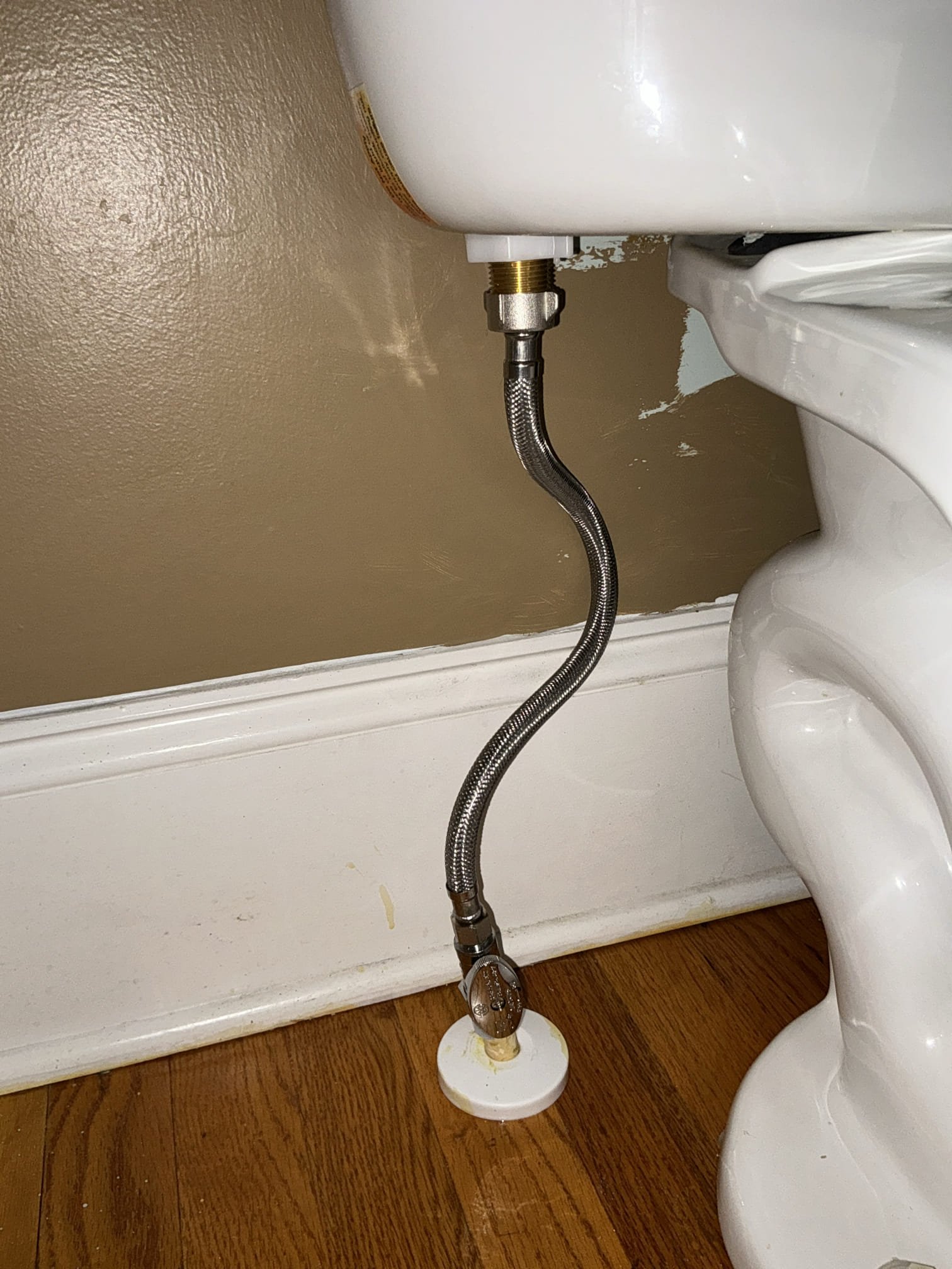 Rebuild toilet on main level powder room. Remove old internal parts of toilet and install new fill valve and new flapper. Supply line to toilet was replaced with stop valve by Chen about month prior. Test toilet for proper operation and clean workspace 

Checked water heater and pressure to home. Heater is working great since installed about month ago and pressure is 65 psi in home. All plumbing is working properly 