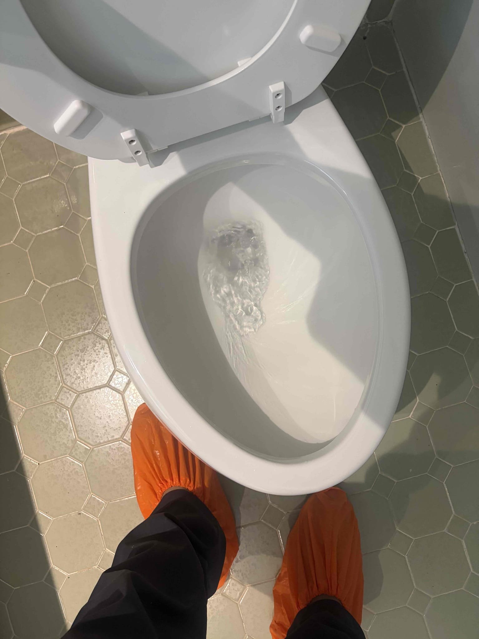 Upon arrival, customer stated they are wanting to replace upstairs hallway, bathroom toilet. Provided customer estimate to replace toilet. Customer approved estimate. Replaced toilet, with Western, normal height, elongated toilet. Also replaced emergency stop with quarter turn stop and new supply line. Tested toilet, toilet is flushing and not leaking at departure. Caulked base of toilet. 