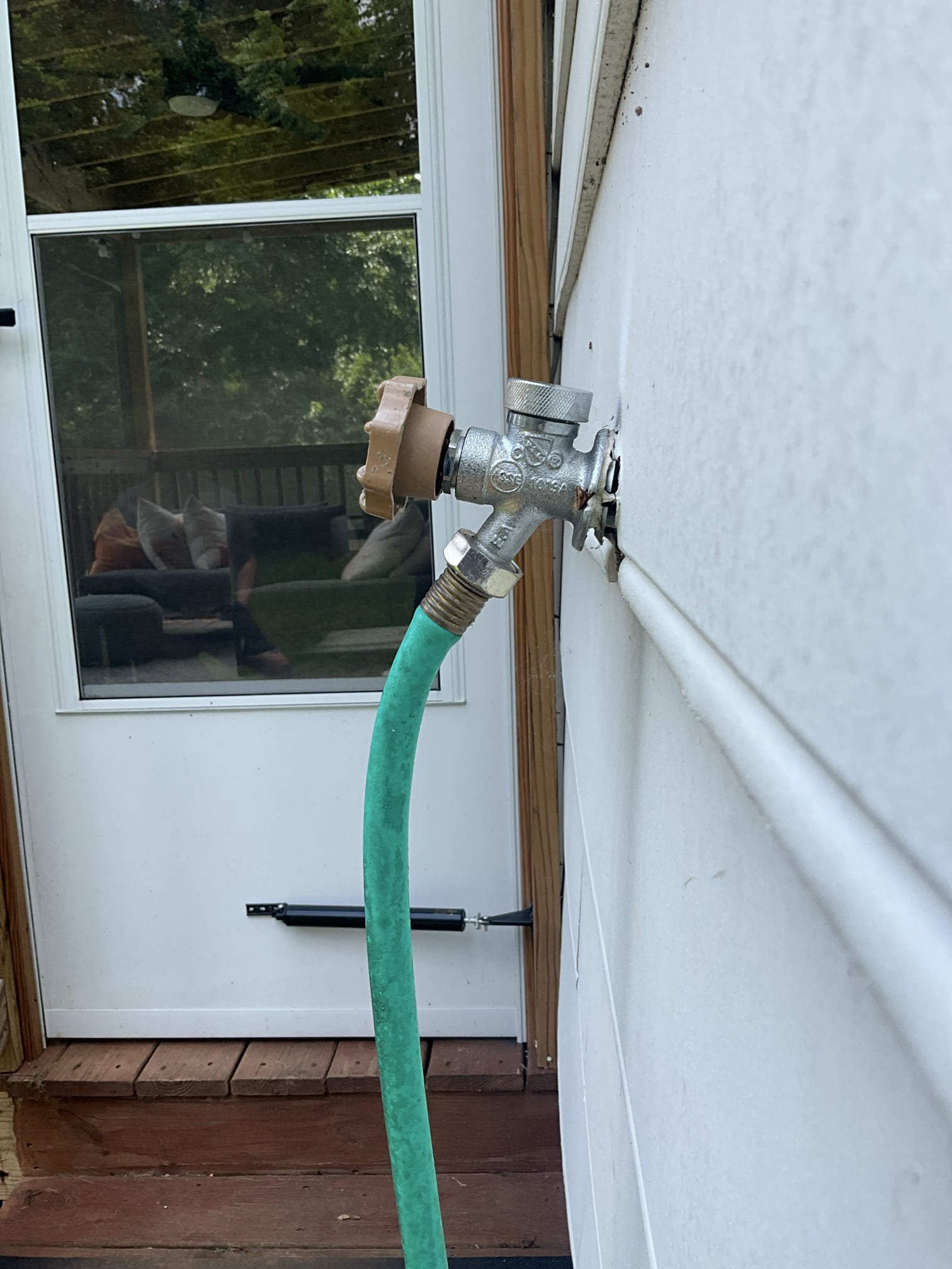 Customer had a frost proof hose bib that was leaking in the wall in the backyard. Upon inspection, noted to customer that the angle of the drill was back sloped. This is an issue because this doesn’t allow for the hose bib to drain and has greater risk of freeze breaks. The customer didn’t want any additional cut on either side of the wall. Obtained permission from customer to straighten the cut out to at least get the drill point to more level. The previous installed had done a square cut in the siding so it was more prominent when the drill mark was leveled. Also flushed customers tankless water heater. Pointed out failed thermal that wasn’t strapped properly and can lead to pipe breaks. Customer declined work on the replacement of the thermal expansion tank at this time.