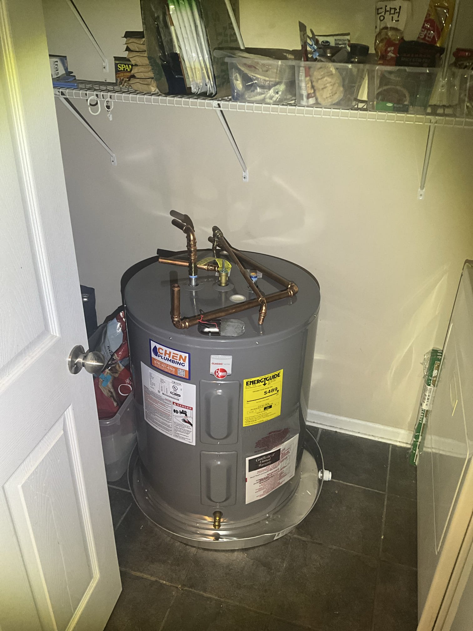 Returned and uninstalled the water heater. Capped after the ball valve on the cold line and put a temporary cap on the incoming hot line. Put water heater in laundry closet per customer request. Shut power off to the heater in the breaker box and put safety wire nuts over the electrical connections. This is trip 1 of 2. Will return for quoted price to reinstall the heater.