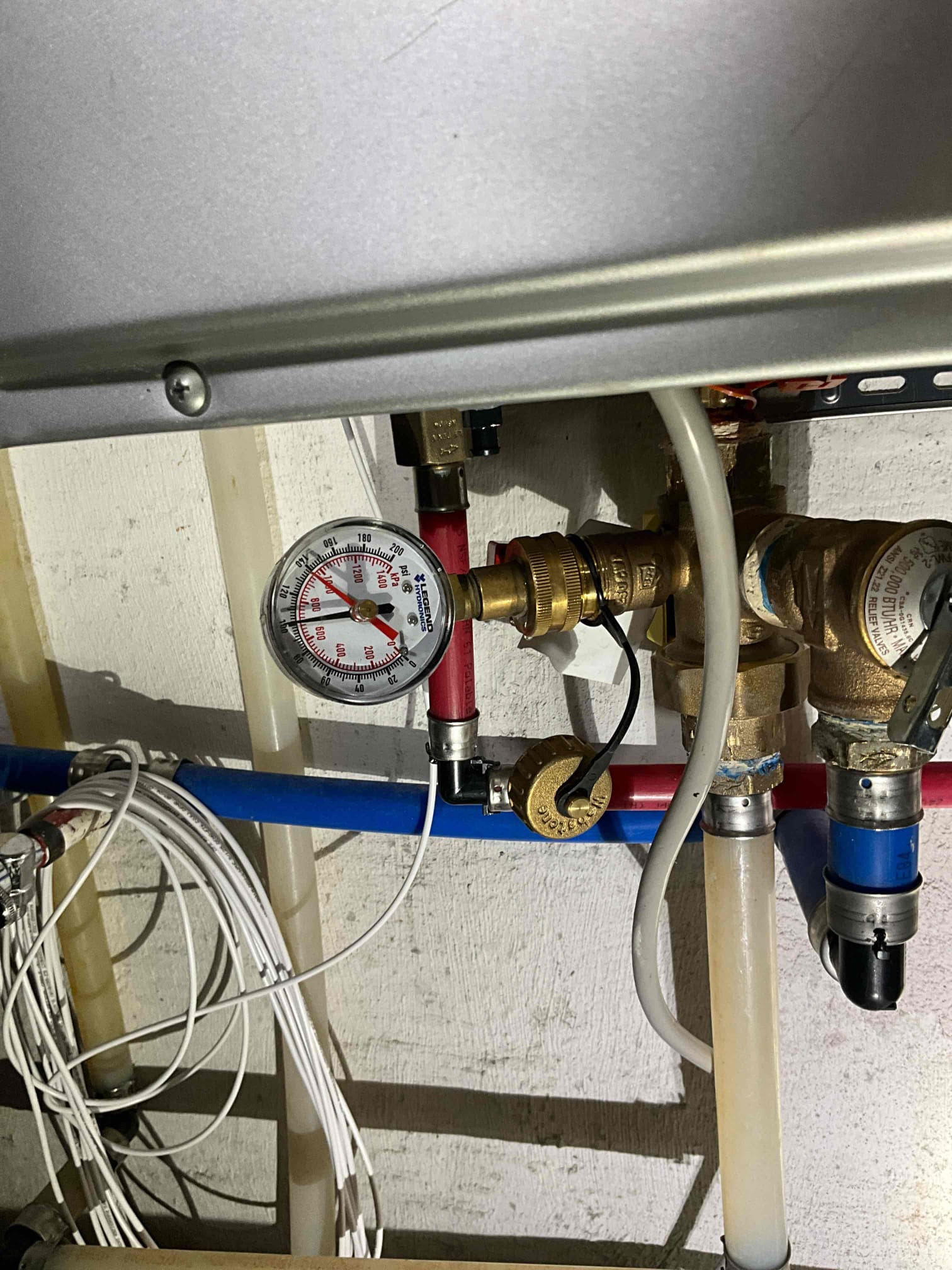 Came out for multiple issues. Sewage ejection pump backed up over the weekend. Was working normally when we arrived. Ran the pump through multiple cycles to ensure pump and float were working. The vent for the pit was installed with an AAV. This style system cannot be installed with an AAV and must be atmospherically vented. Back up likely occurred due to the system getting air locked. Left quote to install vent to the outside of the home. Tankless water heater needed a new valve kit and the condensate drain replaced. Left quote for a new PRV as water pressure is at 100 psi inside the home. Hose bib in the front of the home needs a new handle. Emailed quotes over.
