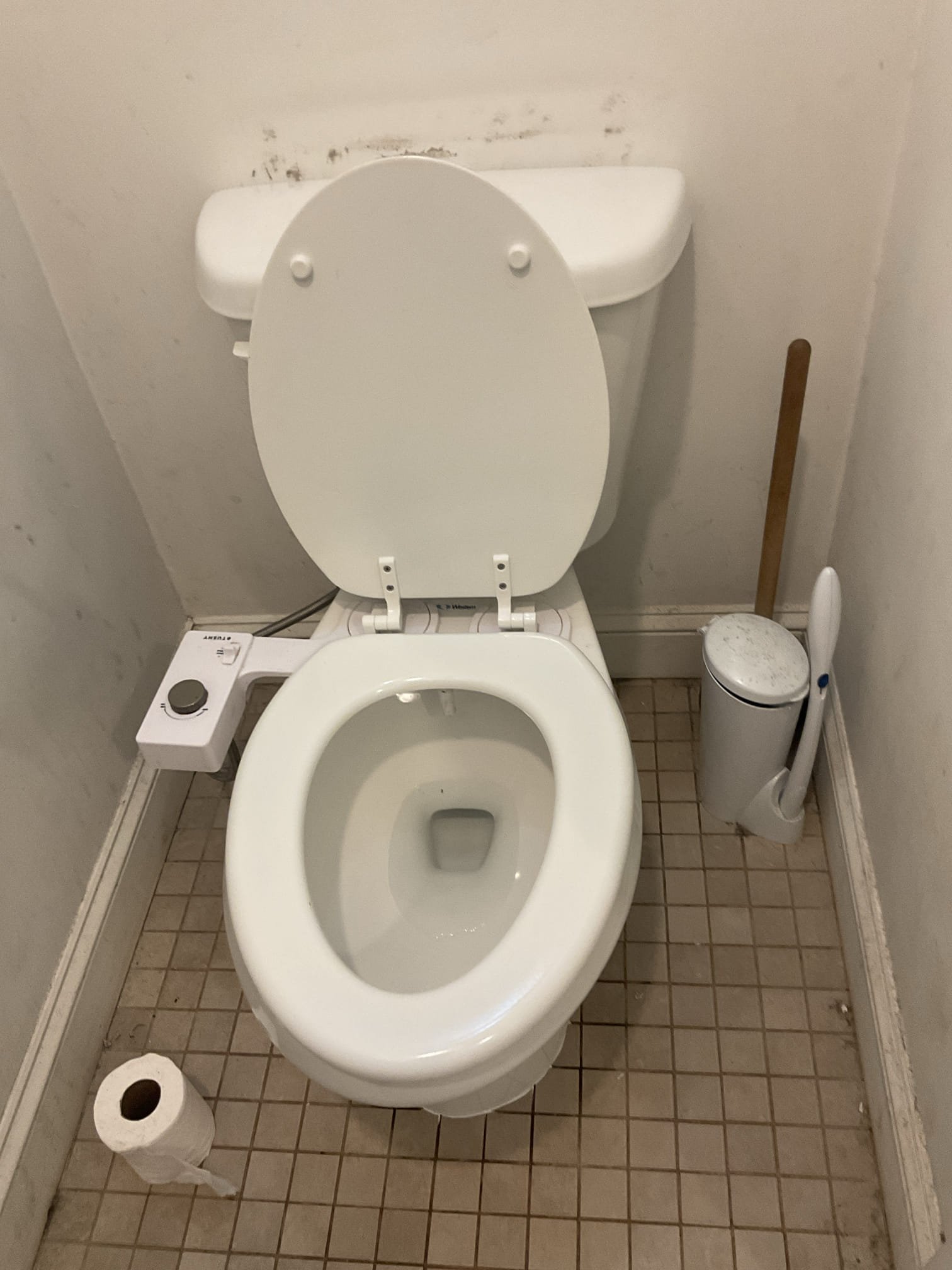 Replaced a cracked toilet ( tank ) with a western elongated toilet , reinstalled bidet seat attachment back . 