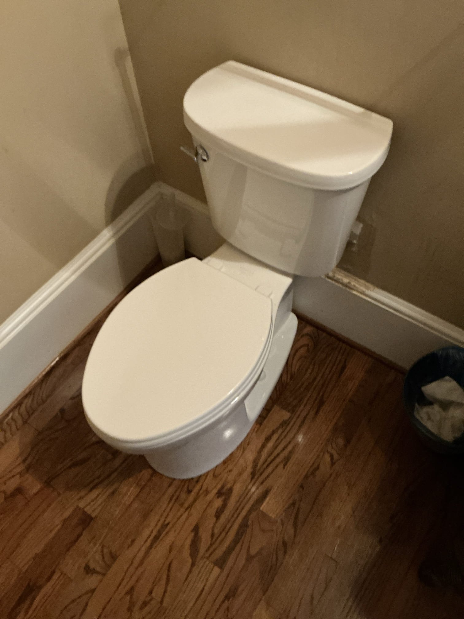Shut off water to toilet and remove old 1 piece toilet. Provide and install new Kohler 2 piece toilet. Install new toilet with new wax ring, toilet bolts, and new supply line. Test for proper operation. Clean workspace 