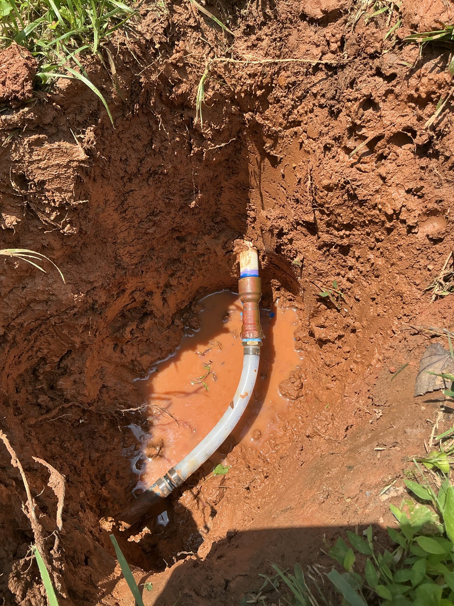 Diagnosed leak near meter where previous repair was made. Found fitting to be defective and leaking from crack. Removed cracked fitting. Install new adapter from pvc to pex in cased in brass and reconnected waterline. Tested repair for proper operation and leaks. No leaks found after work completed and meter is not spinning 
