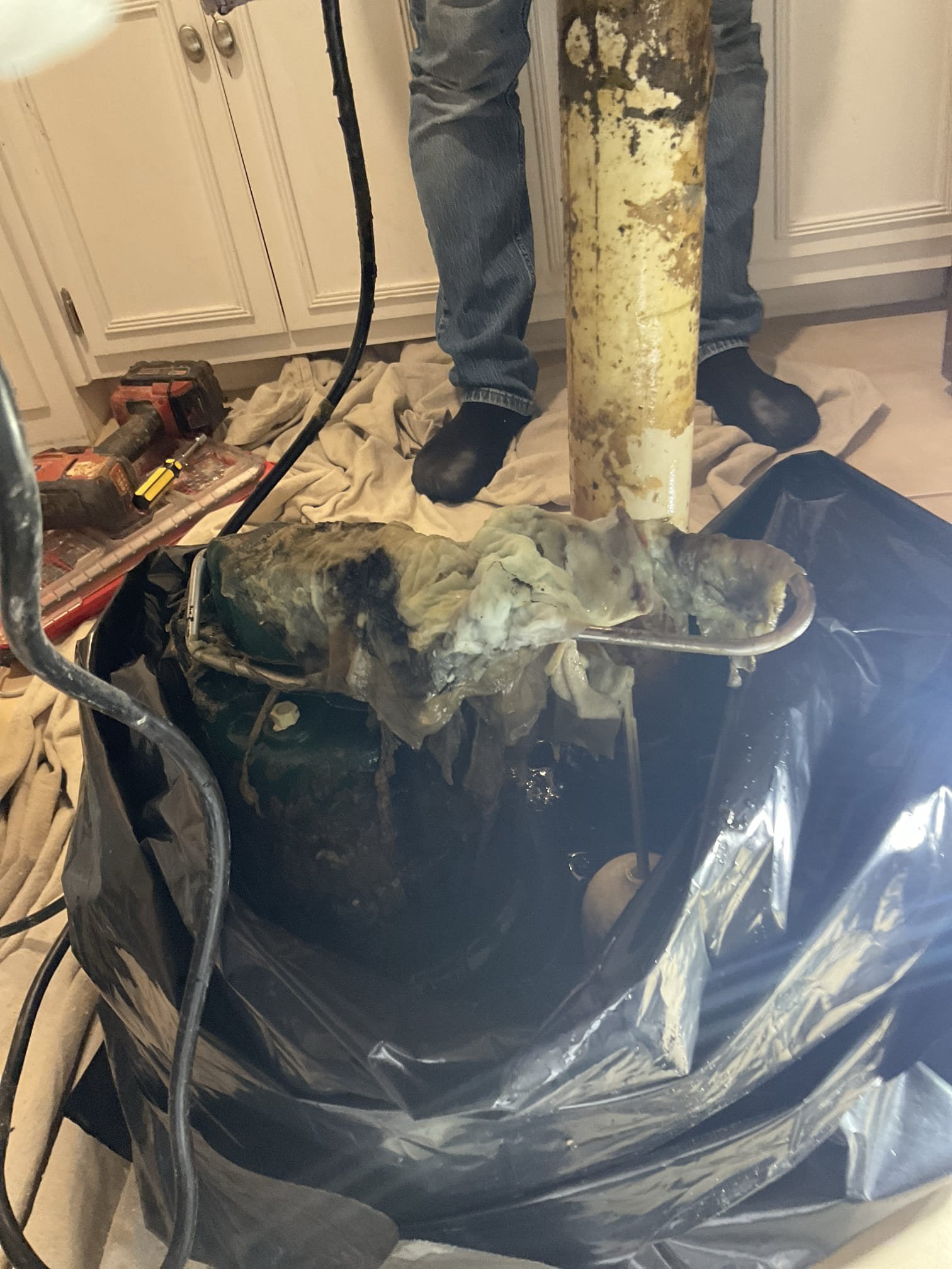 Replaced a basement sewerage ejector pump as warranty call , charged labor only , pump was damaged with improper use with heavy wipe stuff . 
