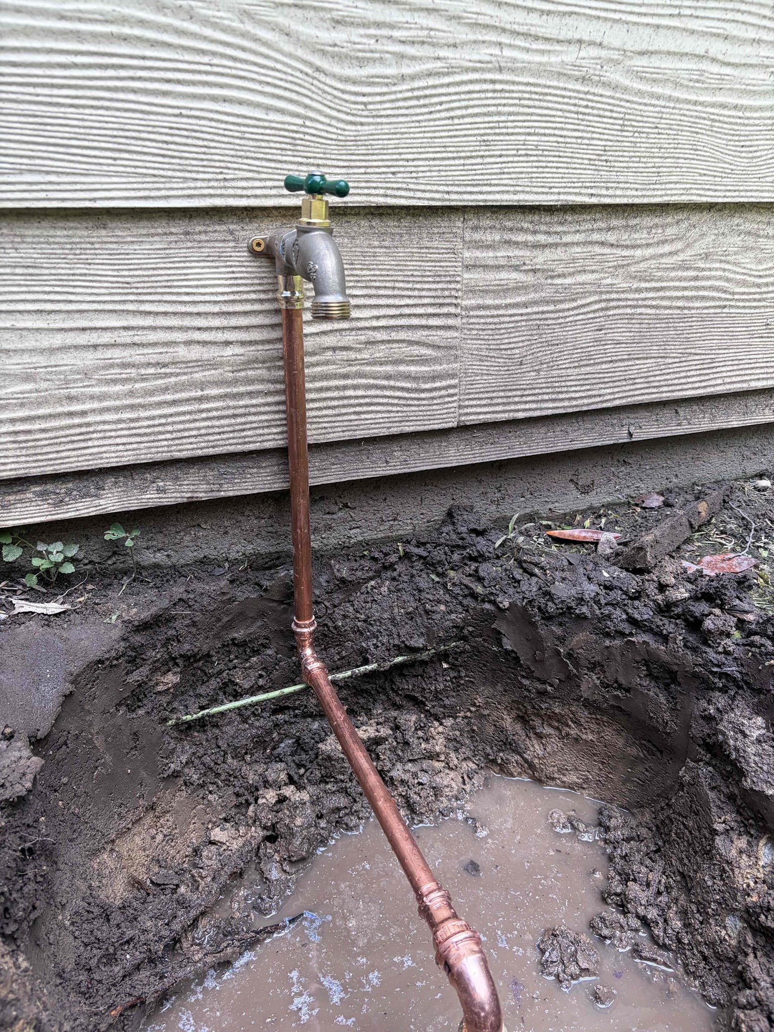 Minor toilet rebuild hallway bathroom 
Dig up and replace hose Bibb in the back yard and affix to the wall

This customer, they had a running toilet in the hallway bathroom due to an old fill valve and flapper recommended to replace the full valve in the flapper so there would be no more leaks going on on the inside of the tank to go along with that the hose bib in the backyard tied off off of the irrigation system the irrigation system gets turned off in the winter. There was a leak from a frostproof hose bib that was improperly installed so there for the recommendation was to dig up the frostproof hose bib and fix it to the wall with the drop your 90 so that is exactly what we did dug up a section of the dirt to access the PVC pipe below glued on a fitting following that installed pro press connections in order to properly get everything fixed right following that we have fixed the drop your 90 to the wall and thread it on the new hose bib Once complete. There are no leaks. Put the d