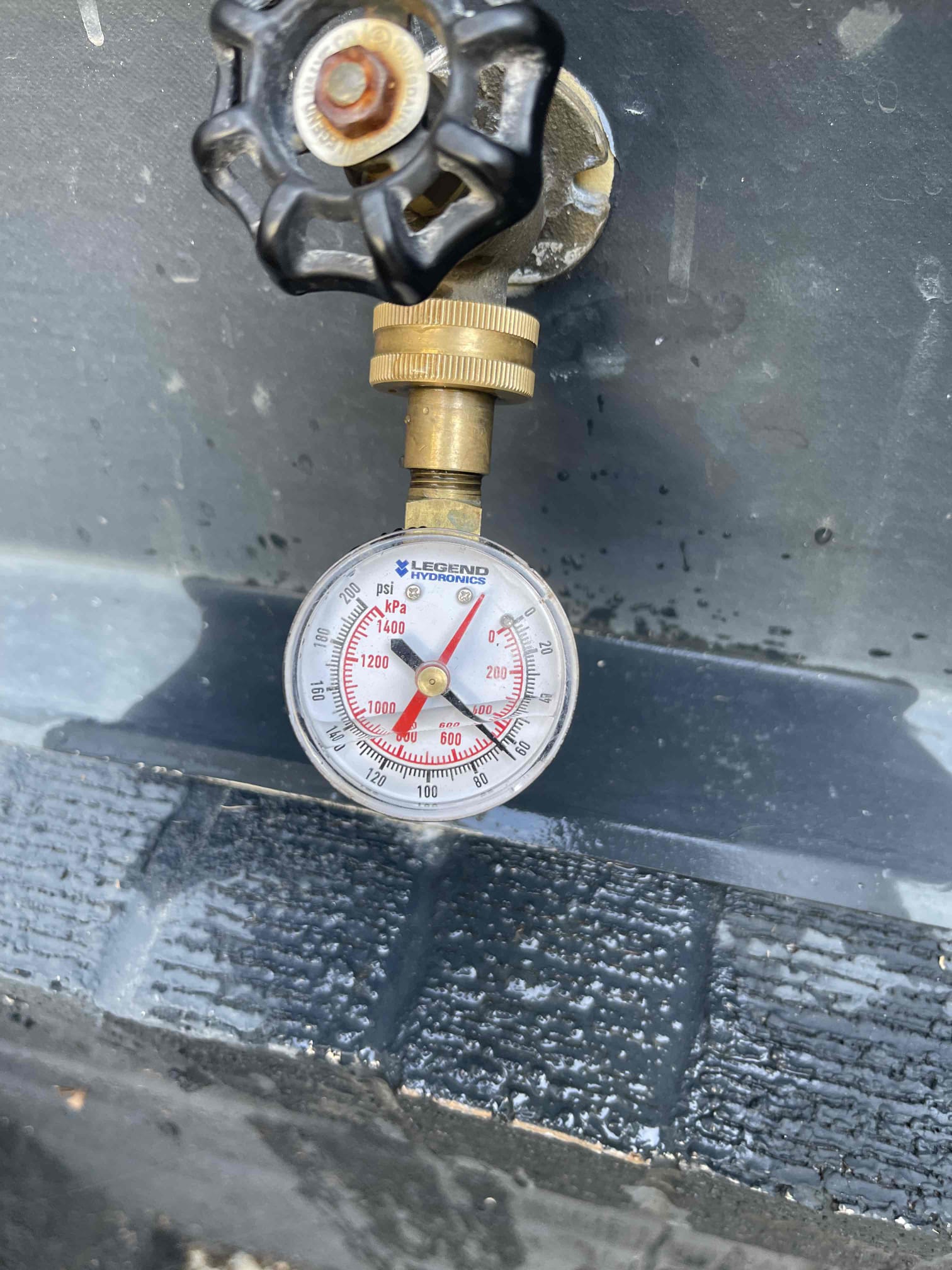 Came out for low water pressure. Customer was not having any significant drops in pressure, but static pressure downstairs was reading 40 psi. Customer said his master bathroom shower on the top floor had low pressure. Customer was losing around 10 psi due to gravity lowering the pressure moving vertically up from the basement. We received approval to adjust his PRV. Increased the water pressure to 65-70 psi. Customer tested his shower and confirmed water pressure had increased. We confirmed water pressure was not dropping more than 5-10 psi when a fixture was opened, indicating PRV was still working normally. Left quote to install a new RO system and gave customer a recommendation of the unit to purchase, as his current system is not needing his capacity needs. 