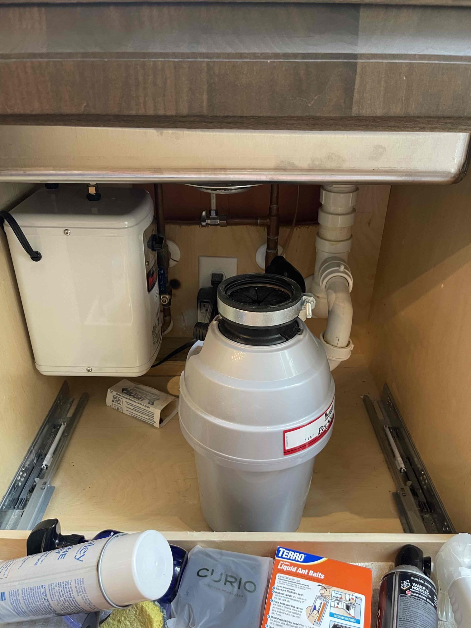 Came out for a garbage disposal that fell inside the cabinet. It was not the same disposal another technician installed. This was the secondary disposal on the side sink. The stainless compression band gave out and the disposal fell, snapping the waste arm off inside the disposal. We received approval to replace. Went and purchased a new 3/4 hp disposal and installed. Tested to ensure proper function and a leak free installation. 