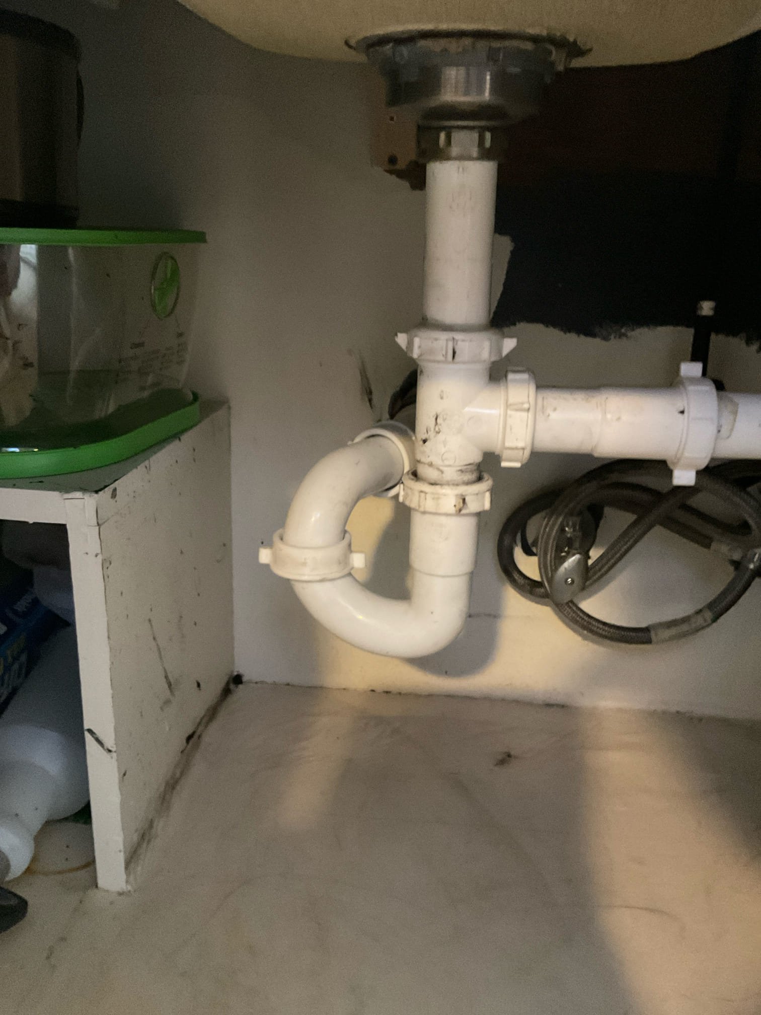 Customer stated that there was a leak under the kitchen sink and also that kitchen sink was backing up. Stated to customer that we need to rework piping under kitchen sink and also run snake to attempt to clear stoppage and customer agreed. Went ahead and attempted to run snake from underneath kitchen sink and also from vent on roof. Wasn’t successful on getting kitchen line opened up. Went ahead and replaced piping under kitchen sink to take care of leak issue. Gave customer options as far as next steps to get the kitchen sink back up and flowing and customer agreed to have kitchen line jetted. Will return Monday morning to jet kitchen line. Cleaned up work area.