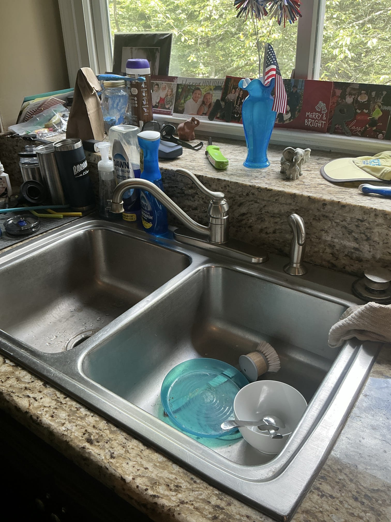 Diagnosed leak at kitchen faucet. Found kitchen faucet sprayer leaking heavily in cabinet below. Customer would like to install new drop in sink and faucet as well as new disposal. Left estimates 