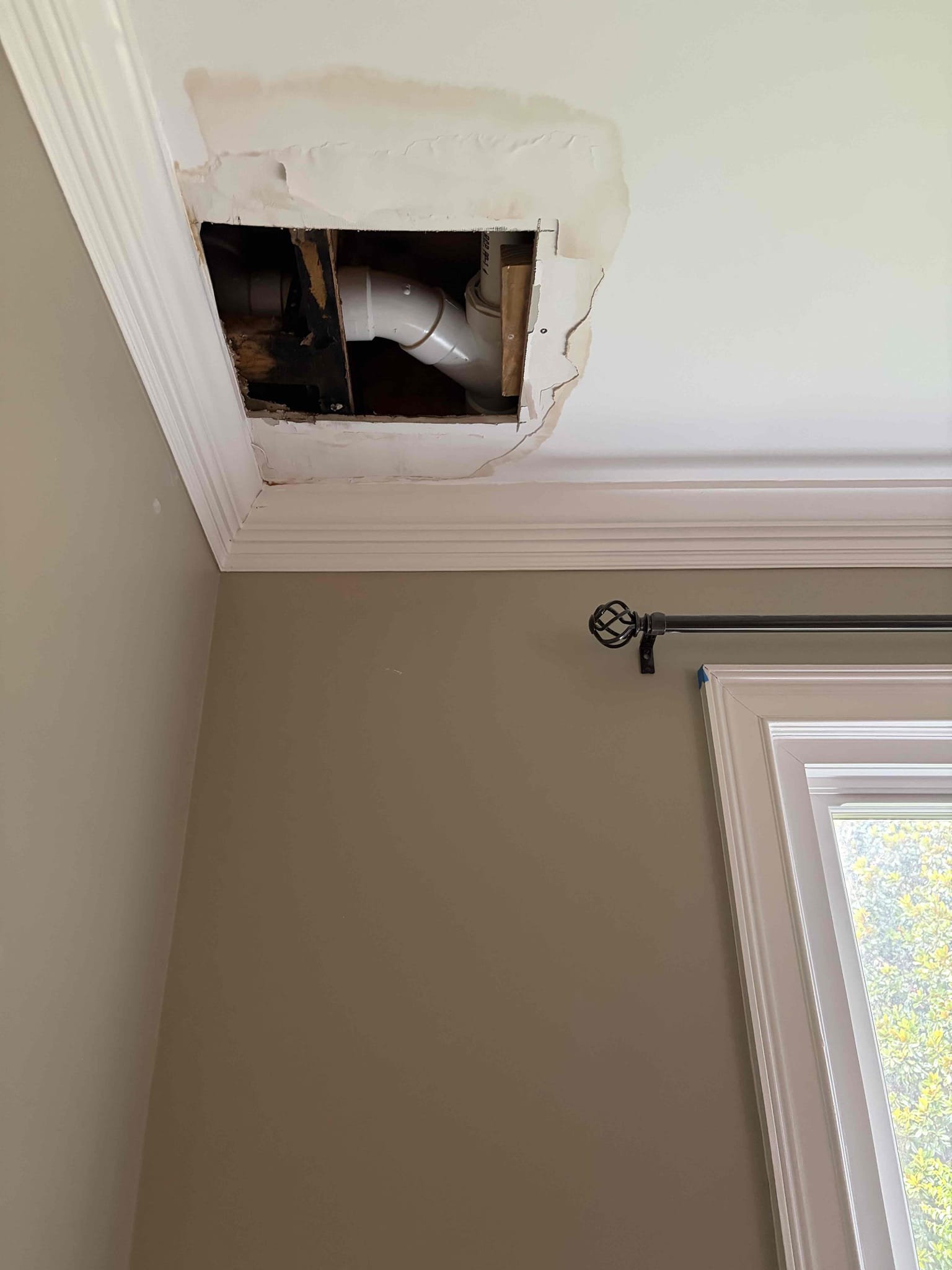 For this customer, they have a leak in the ceiling coming from the toilet line. There looks to be a pinhole leak in the PVC pipe work, unsure of how it happened. However, whenever the toilet is flushed, water leaks out from the line, causing it to drip down to the bottom of the ceiling from my understanding what needs to be fixed is the cluster for the flange following that we would have to run new PVC cut the drywall below even more to connect to the 2 inch lateral line following that we would have to go into the wall next to the window for the 3 inch stack to redo the cluster to make it work properly. The customer wants to wait on doing the work as of right now to see if the insurance company needs to remediation work before beginning. Water pressure is normal.