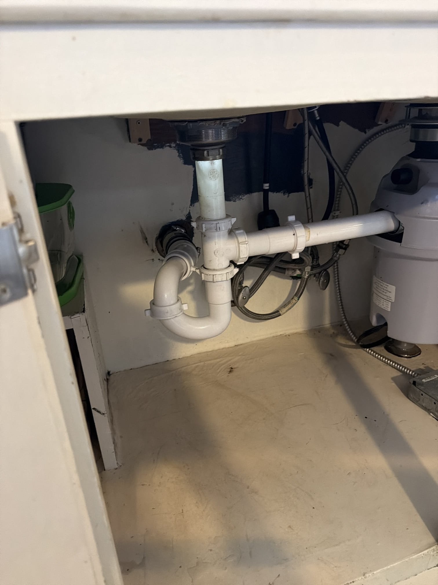 Returned to jet kitchen drain line from roof vent. Was able to get stoppage cleared and tested and now kitchen sink is drain as it should with no leaks present at this time. Also customer mentioned that tub was leaking and attempted to recreate leak but couldn’t get it to leak and also didn’t see any signs of leaking. Told customer that if it leaks again try to pin point it. Cleaned up work area.