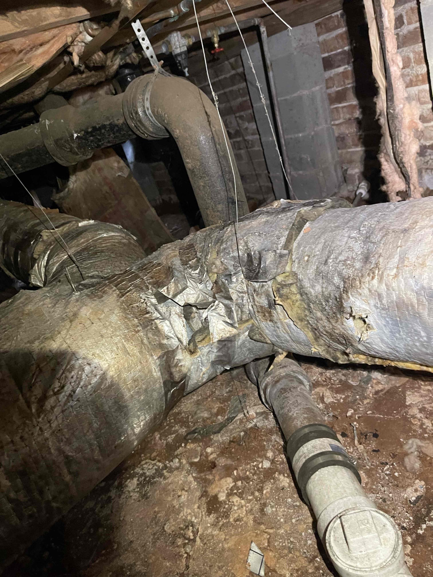 Came out for the kitchen sink not draining. Arrived and inspected the piping. Found all of the piping was holding water. Went down to the crawlspace and found the kitchen line had been replaced, and the main drain leaving the house was replaced, but there is a 10’ section of cast iron connecting the two pvc sections, and in this section of cast iron is where the soft tissue blockage occurred. We were able to get a hose up the pipe and rinse off the gunk out of the line so we could clearly identify a soft tissue blockage and took a picture of it. We cleared the blockage and restored flow. Left quote to replace the section of cast iron in the crawlspace. Also left a quote to replace the washing machine box and drain under the slab. Left quote to repipe both bathroom groups inside of the home. No further issue at this time. Left customer a drawing that gives a general layout of the house and the piping, and a breakdown of where each repair estimate is so that she more clearly had an under
