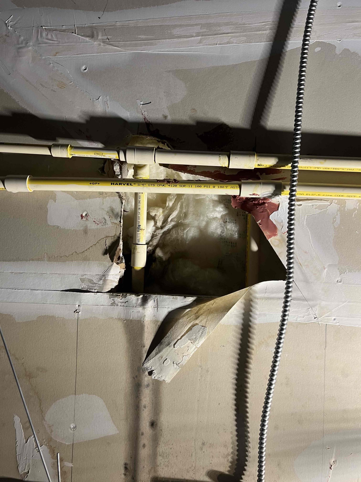 Customer had leak on CPVC line in ceiling. Cut out repair attempt and replace section of CPVC. Waited for glue to dry and turned on water to check for leaks and proper function.