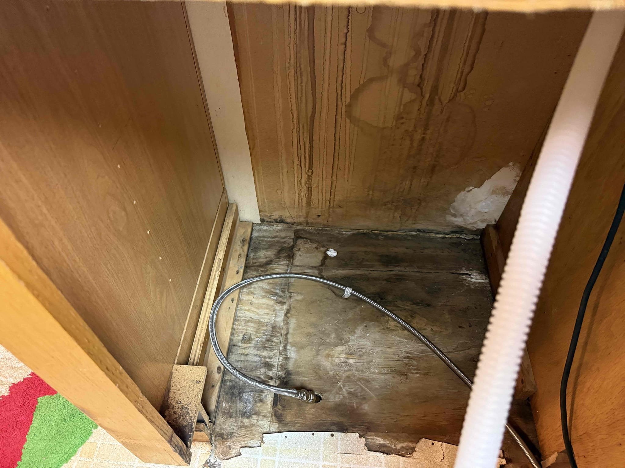 Upon arrival customer stated he noticed water by his cast iron pipes noticed two holes in the cast iron causing the water, kitchen faucet leaking, garbage disposal not working, and dishwasher supply line stubbed through floor not allowing him to install his dishwasher. Gave customer estimate to replace section of cast iron, install a new faucet, install a new 1/2 HP garbage disposal, and tee off of the hot line from kitchen sink to dishwasher and cap old line in the crawlspace. Customer approved the estimate. Replaced section of cast iron pipe and connected back to main line, installed new kitchen faucet with new supply lines, installed new 1/2 HP garbage disposal, and installed a 1/2 x 1/2 x 1/2 tee to branch off the hot side on kitchen faucet with two new supply stops and new supply line, capped old dishwasher supply line in crawlspace. Installed dishwasher as courtesy no warranty. No leaks upon departure
