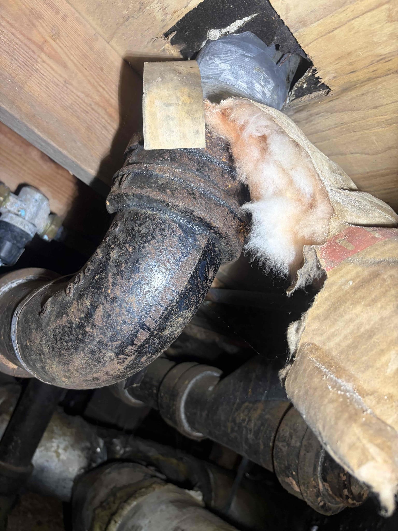 Upon arrival, customer stated that they are experiencing a slow draining sink in master bathroom. After inspection, found galvanized and corroded copper drain lines. Informed customer attempt to clear blockage, cleared blockage. Also found galvanized, drain pipe leaking and wall. Informed customer, to make full repair we will need to re-pipe both bathrooms that are currently piped in cast-iron. We will install new PVC. We will install two new flanges, two new vanity, rough fence, and tied back onto PVC in crawlspace. We will return tomorrow morning to perform work. 