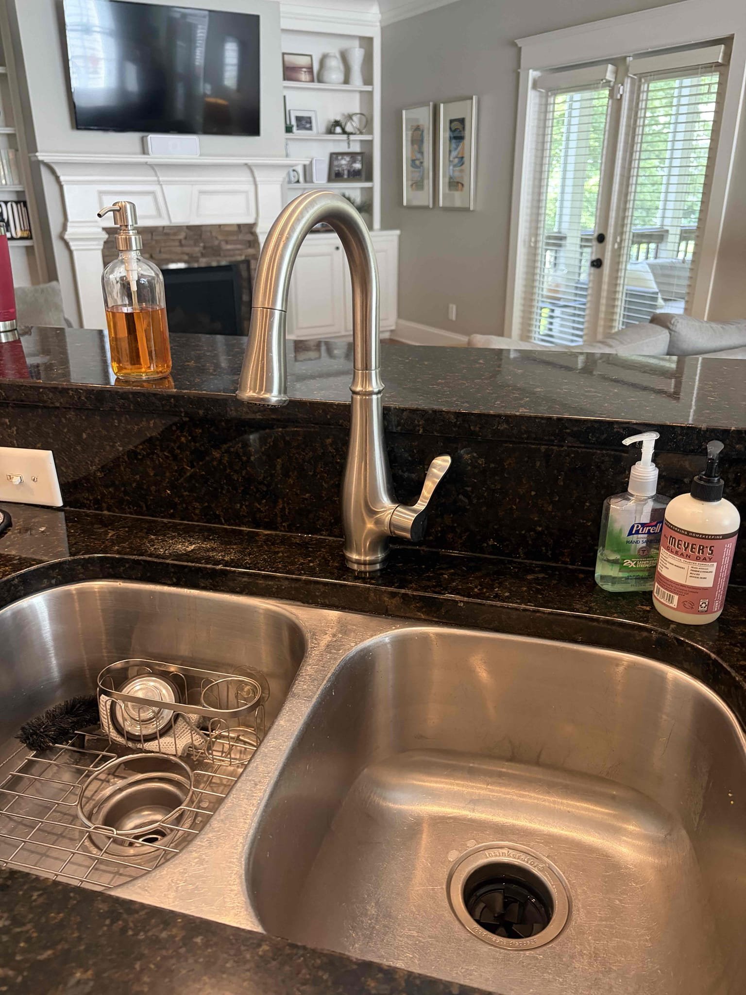 Replaced kitchen faucet with customer supplied Kohler faucet. Faucet is working and not leaking at departure.