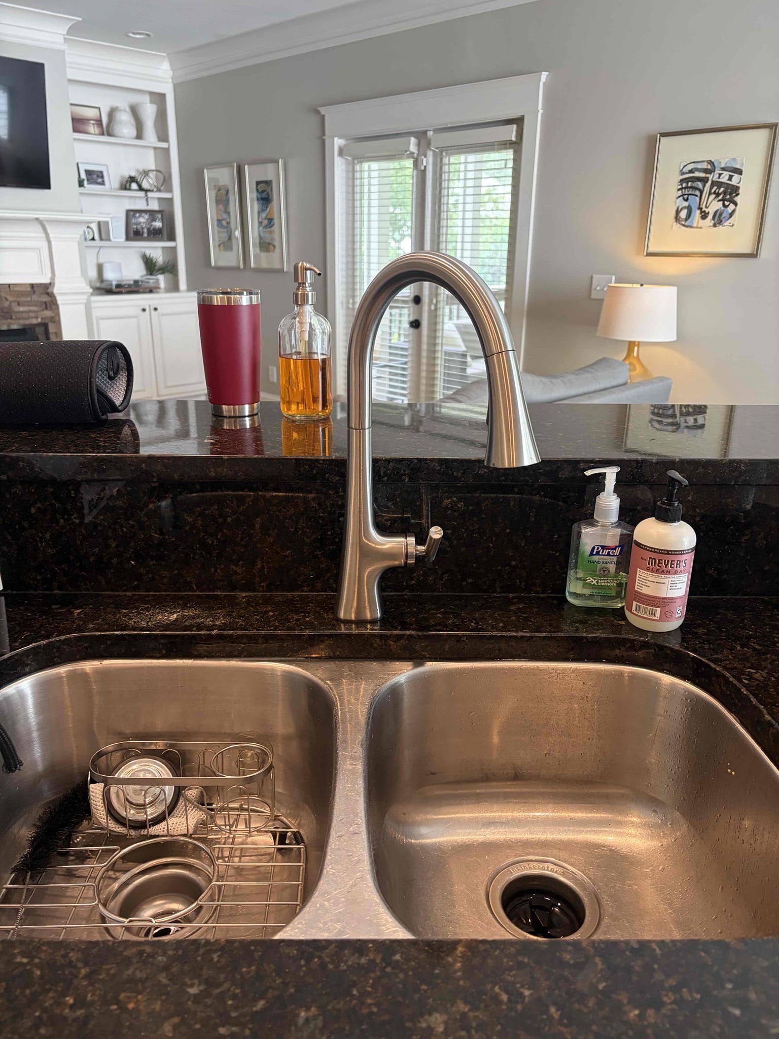 Replaced kitchen faucet with customer supplied Kohler faucet. Faucet is working and not leaking at departure.