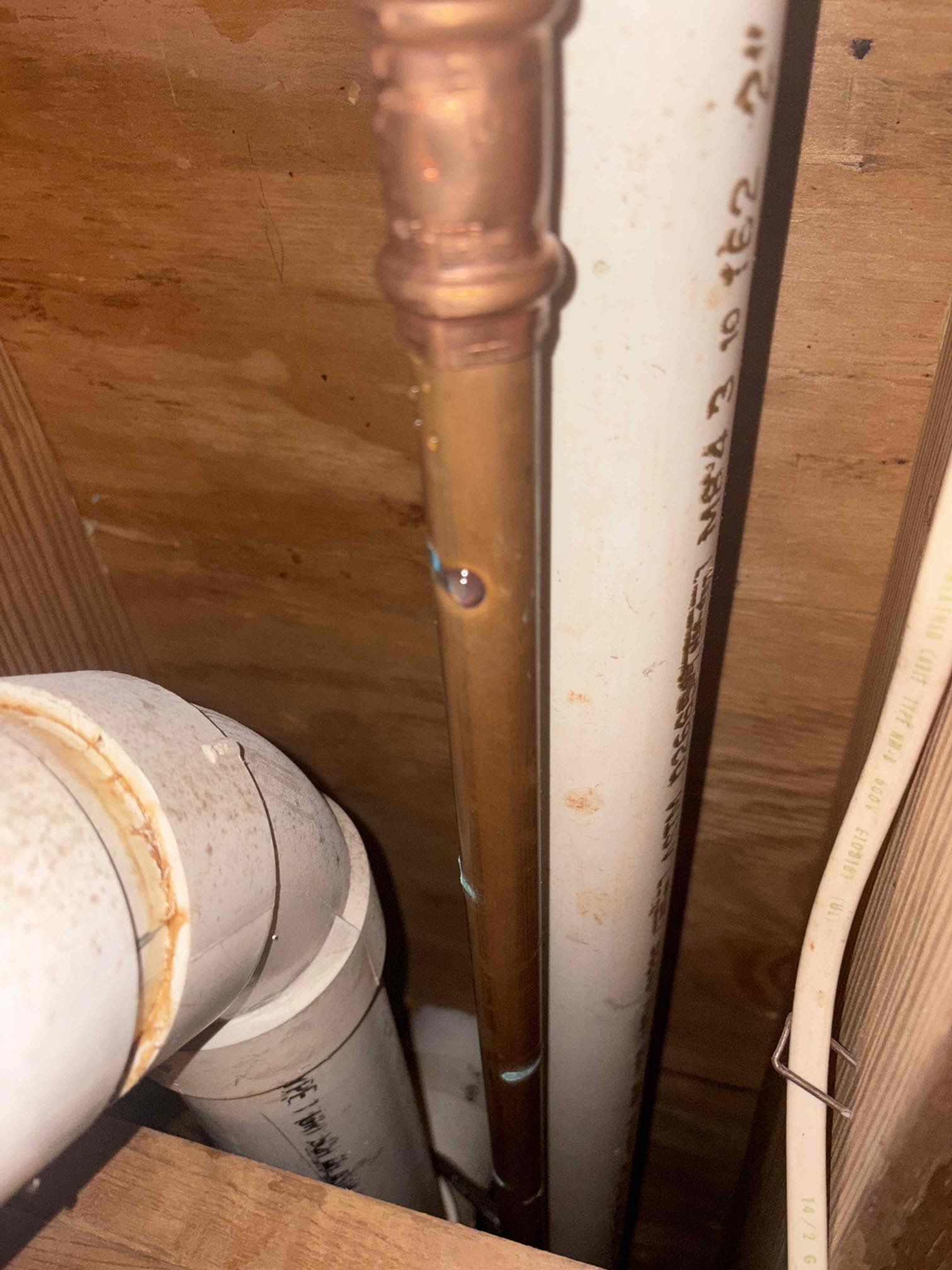 In upstairs storage closet. Exposed copper lines inside have corroded spot and now are dripping water. Shut off water to home and drain water system. Cut out section of leaking pipe. Install new section of copper pipe. Turn on water and test for proper operation and leaks. Clean workspace 
Leak coming through garage and has hole. Looked through hole and found leak. Leak appears to be coming from leaking toilet at seal above. Pull toilet on second level. Remove old wax ring and bolts. Install new toilet bolts, new wax seal, and new supply line. Test toilet for proper operation and clean workspace 


As courtesy replaced couple gaskets for Ptrap underneath kitchen sink. 
