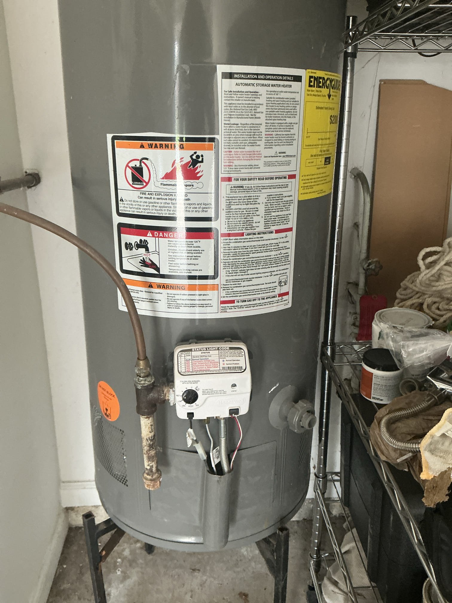 Diagnosed leaking water heater. Heater is in fact leaking. Age is unknown because water heater stickers have been removed. Guessing was a possible warranty replacement heater. Left estimate to install new heater and to also install new pressure regulator. Pressure is over 80psi and the valve looks original to home