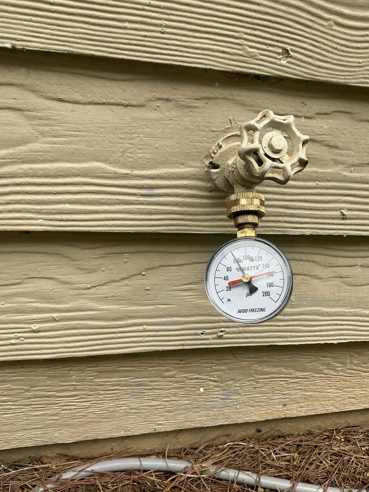 Diagnosed leaking water heater. Heater is in fact leaking. Age is unknown because water heater stickers have been removed. Guessing was a possible warranty replacement heater. Left estimate to install new heater and to also install new pressure regulator. Pressure is over 80psi and the valve looks original to home