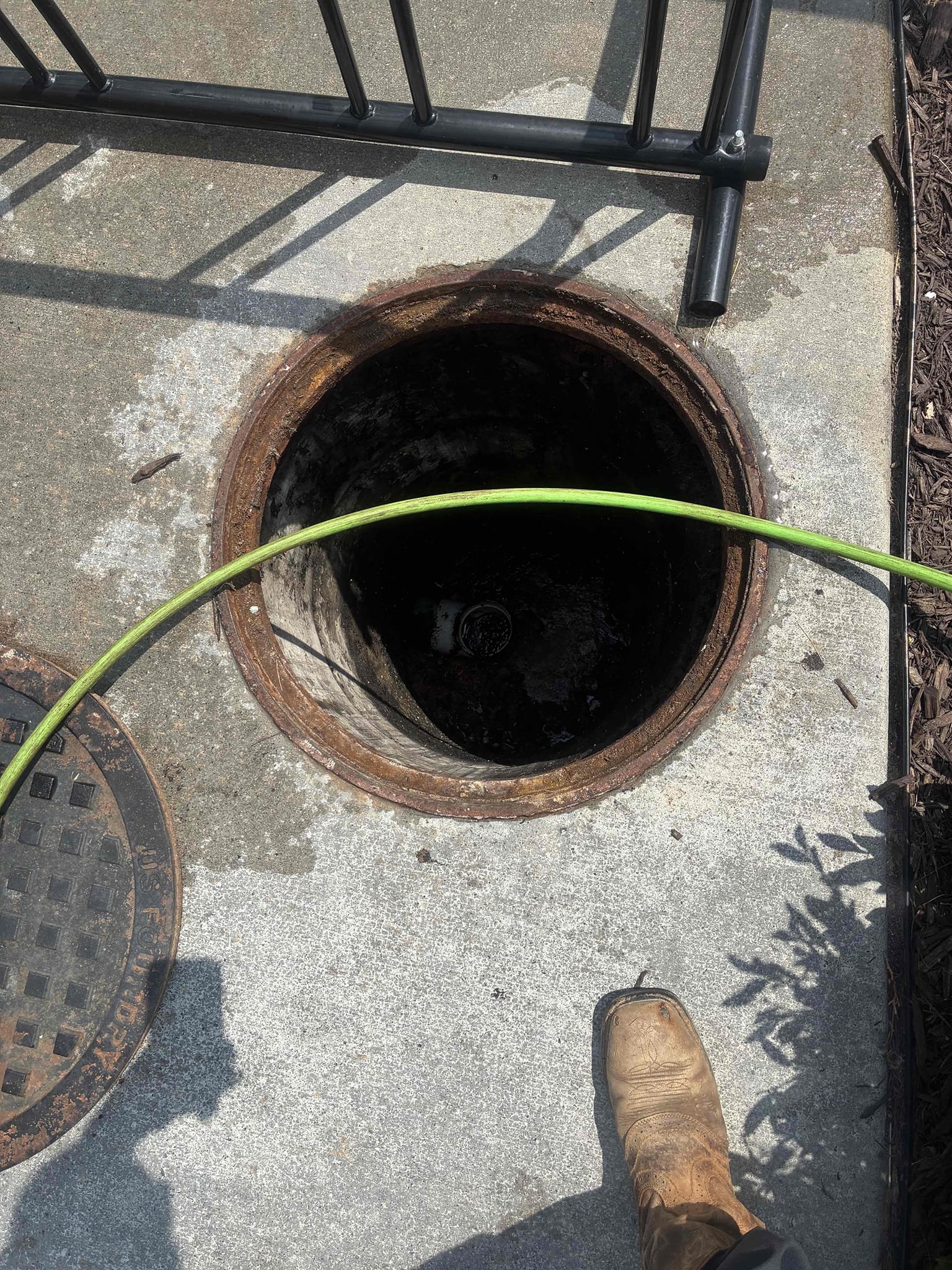 Customer needed jetting maintenance for grease lines throughout restaurant. Old manhole lid for grease trap and entered mainline. Also pulled various clean outs throughout restaurant in order to clear lateral lines. Then return to main line to clear again. After jetting ran large volume of water throughout system in order to clear system to check for proper drainage function. Setback cleanout, and cleaned up area of work.  Also cleared gutter on roof and gutters for overhang of drive-through. Informed customer about issues with drainage on overhang. 
