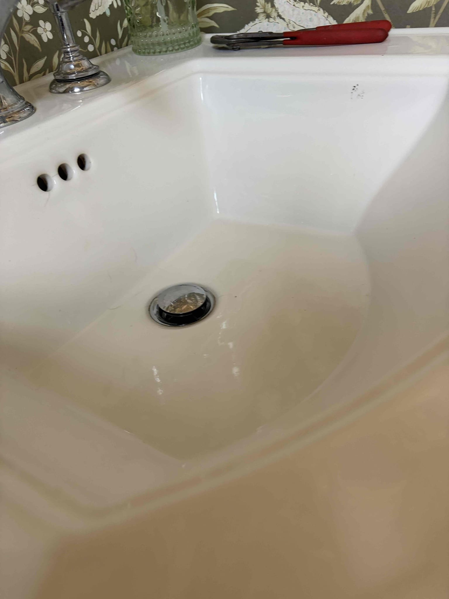 For this Job,  the sink was partially clogged with hair and debris at the pop-up assembly. I ran some water to verify where it clogged at. And it looked like it was isolated to the pop-up assembly only so therefore I remove the pop-up assembly and pulled it out to see what was going on with. It comes to find out it was just hair in grease buildup from overtime in the sink, so therefore I removed the blockage And threw it away once complete. The sink drains like normal now no further action is needed at this time.