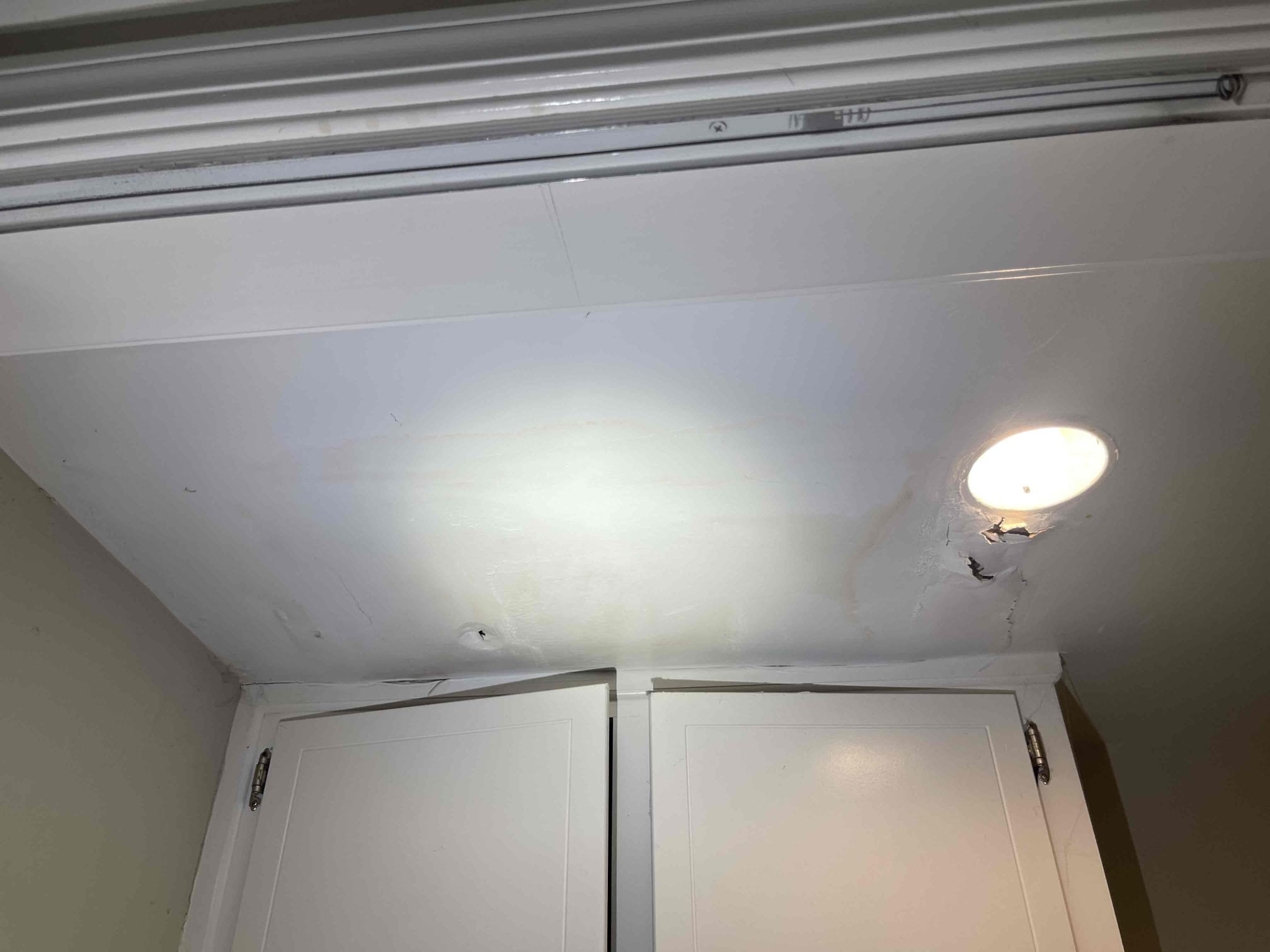 Came out for 2 issues in unit C and D. Summary is as follows:

Unit D: had a cast iron condensate drain that had back up and overflowed onto the floor, running under her flooring in the hallway of her unit. She had turned the AC off to her unit and this did stop the flooding as the unit was no longer condensating. Water level was just sitting at the rim of the pipe when we arrived and not going down at all. We notified our point of contact on file and received approval to snake the drain out. Made multiple passes with the snake, and flushed the drain clear with a 5 gallon bucket of water. Took video of us dumping a 5 gallon bucket of water into the drain to demonstrate the drain is having no problems keeping up with the flow now. No warranty on drain cleaning services.

Unit C: unit c had a leak appearing on the ceiling above his laundry room, which was directly below the bathtub in the upstairs bathroom. There were signs of a previous patch to the drywall. When we arrived, the drywall