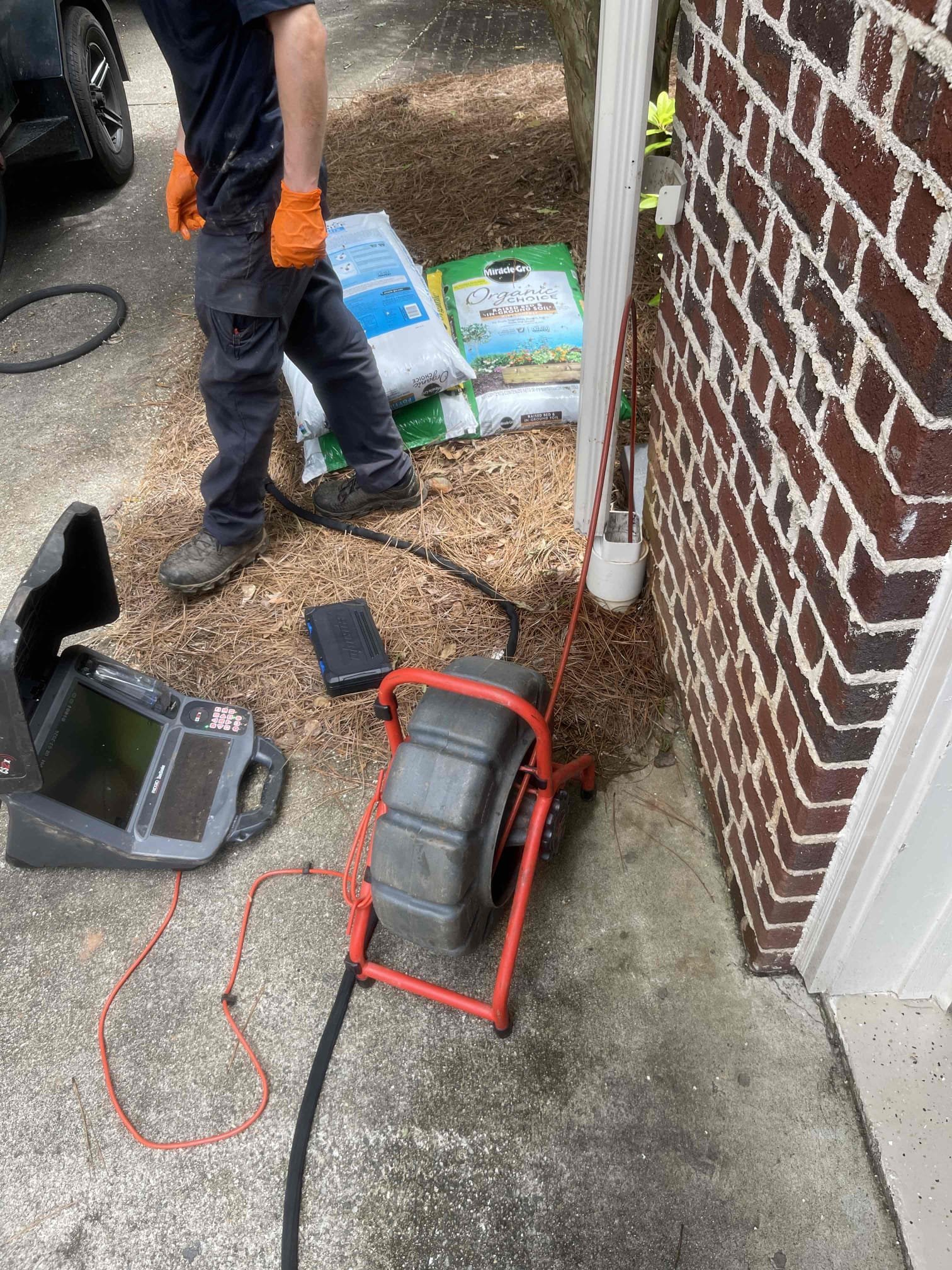 Jetted and camera’d multiples downspouts. Jetted dirt and leaves out of the lines. Located a buried discharge point on one of the lines and extorted proper flow to the drain. No further issue at this time. 