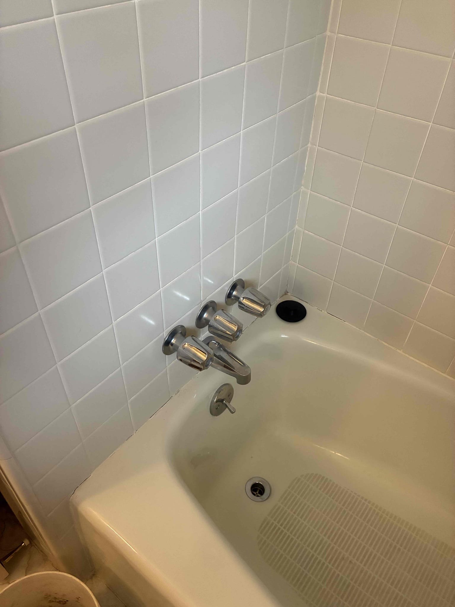 Customer is revisiting issue that has been going on for approximately a year. Customer just avoided using shower because of small leak that would form below shower in ceiling after usage.  Upon arrival, I ran water at tub shower and saw water dripping from stems out of trim at wall. Explain to customer about the possible ways of water traveling into wall from said leak. After approval of repair picked up, trim and stem kit in order to repair price psfister three handle valve. After repair was complete check for leaks and proper function. Customer is aware this is a process of elimination if issue does return.