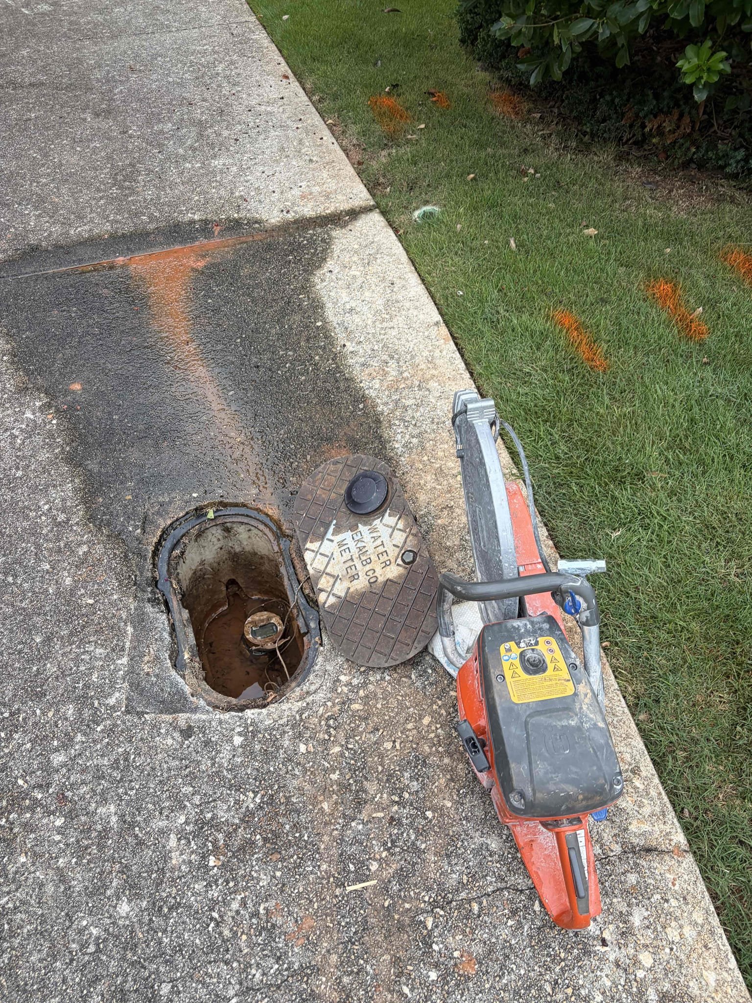 Remove concrete to replace a section of water line in the cement 
We will put the concrete back 
And repair the pipe 
Replacement of water line 60ft 
Bore under drive and hand dig water service lime

CUSTOMER, we install a brand new water service line from the meter to the side of the house. The previous line was blue poly in order for us to properly install this waterline. We had to go underneath the driveway with three boring rods from the premier trencher and then we also trenched a section of grass in the side yard to Connect to inside the home. There was a copper stout coming off the wall so we can connect that with a three-quarter by 1 inch pack adapter installed a brand new black poly line backfilled and straw down so the area that we did wouldn’t wash out when it rains. We put the concrete back for the hole that we had to sawcut open and we got that concrete as level as possible, but it’s not gonna match the same look at the meter we installed a new dual check valve underneath 