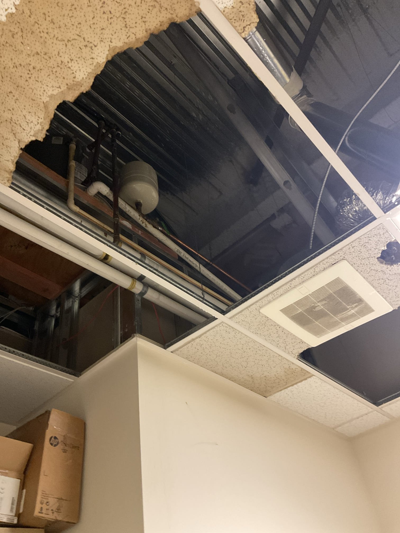 Approved by phone for replacing a busted expansion tank up in the high ceiling area for total $795 , work order number #329405 