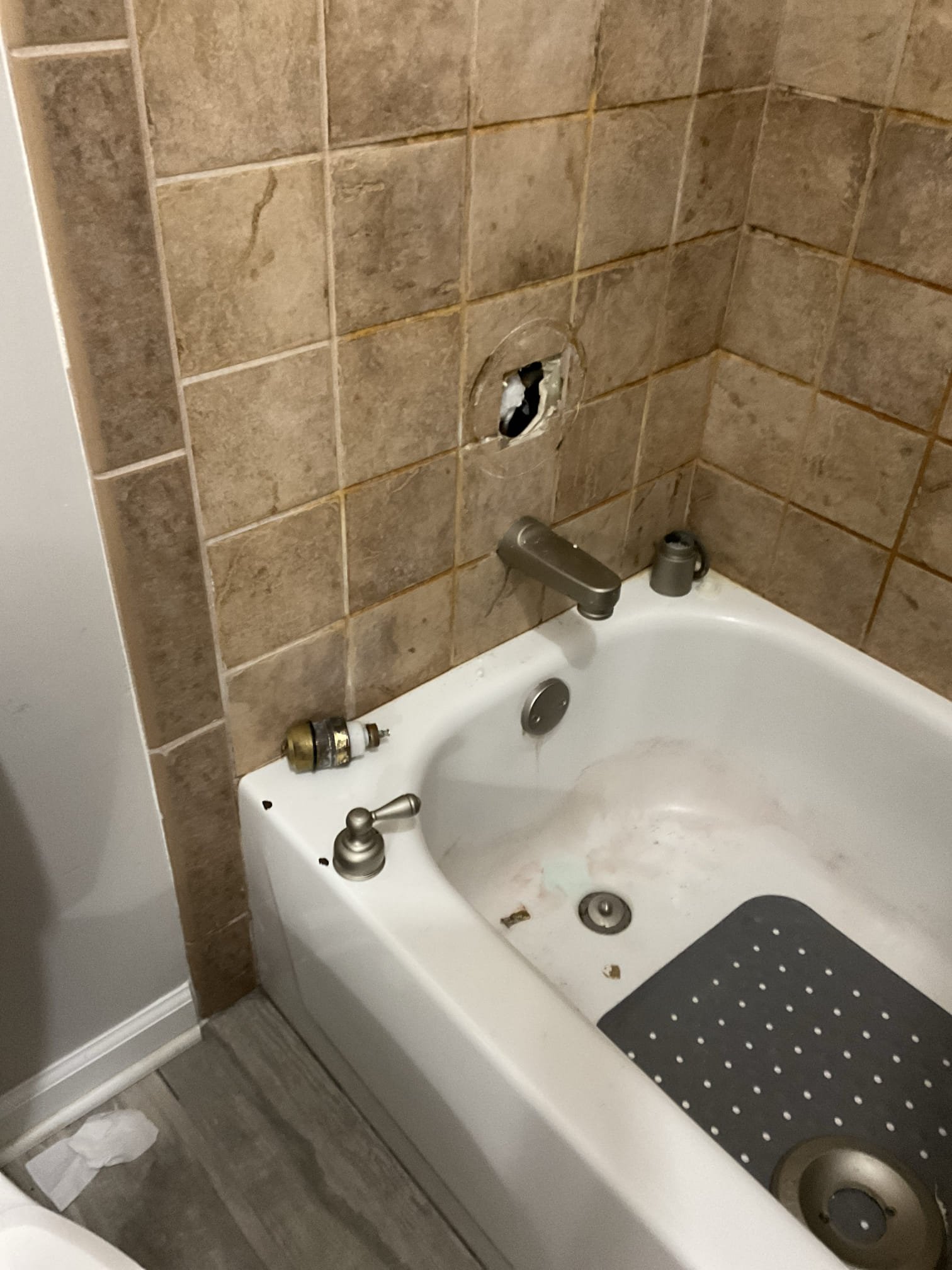 Replace single handle shower valve with delta rough in valve , access cut and panel installed 