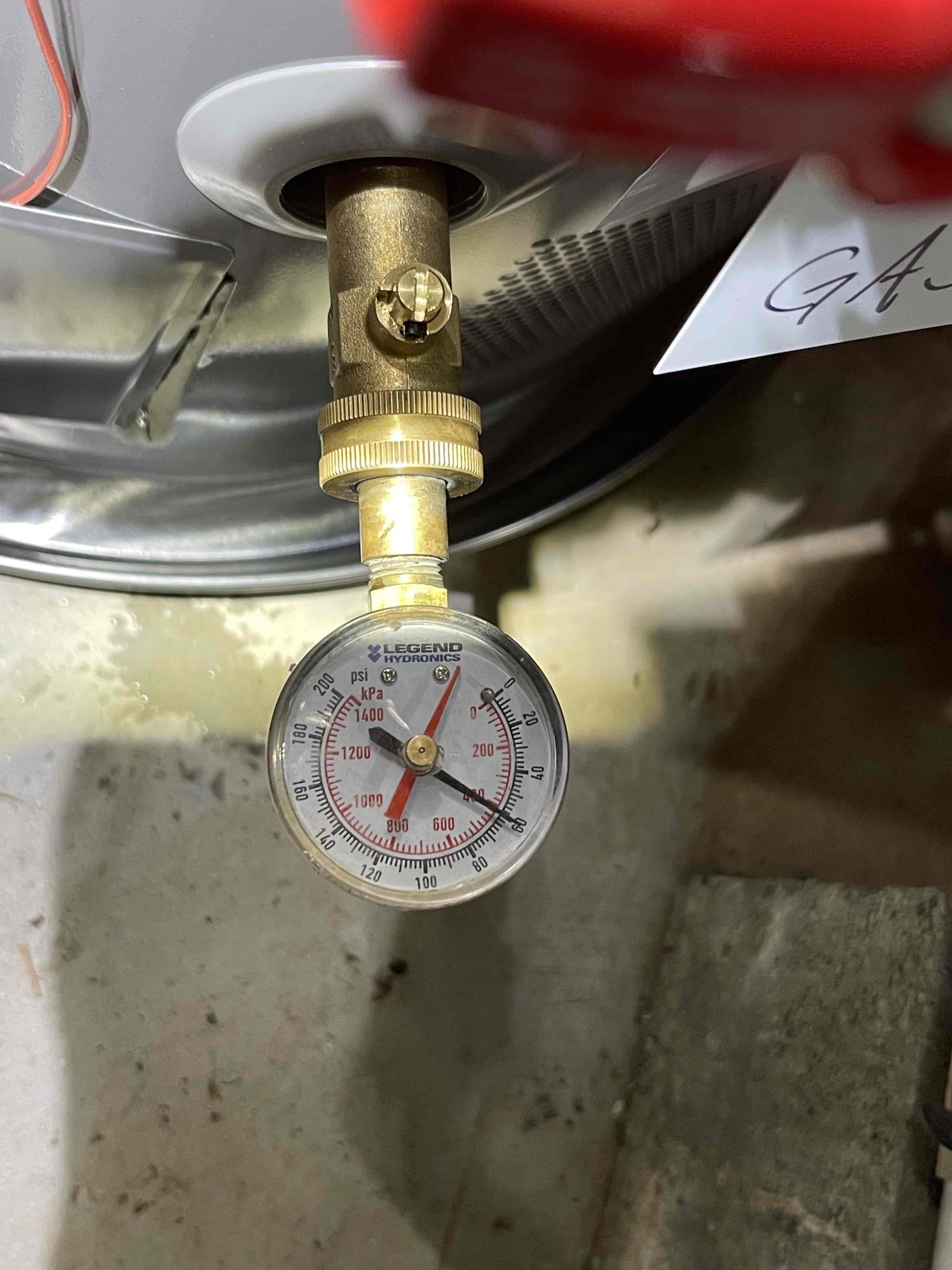 Bring Kohler 3 hold flush valve and tank to bowl gasket on next visit!

Came out today for a disposal, a toilet, and a randomly occur in loud noise. Was going to replace the disposal with the one the customer had purchased, but when I went to start working on it I realized the base of the basin had a crack on it. Notified homeowner and he elected to hold off on the disposal for now until he can get a new sink basin for us to come install. 
Downstairs toilet was inoperable due to a degraded flapper. Rebuilt the toilet but found the proprietary gasket was leaking around the flush valve. I am going to bring the parts to repair the toilet when I return to do the kitchen sink. 
Water heater was from 2008 with a bad expansion tank. Homeowner elected to replace the tank. Installed new 50 gallon gas Rheem water heater and a new expansion tank. Tested to ensure proper function and a leak free installation. 
Water pressure to the home tested at 60 psi as we had replaced the PRV 1 1/2 years ago b
