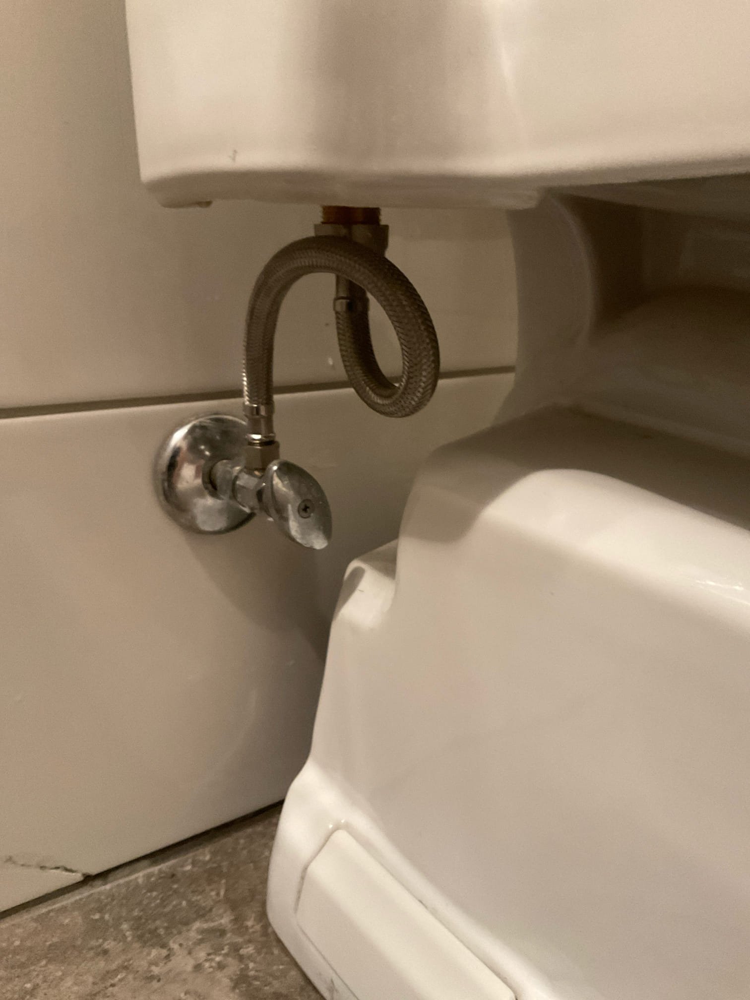 Customer stated that water was leaking from base of toilet. Flushed toilet multiple times and eventually got water to leak from base of toilet. Stated to customer that will have to pull toilet and reset, but there also possibly could be a stoppage. Went ahead and pulled toilet and found that there was a stoppage about 13 feet away made of soft tissue. Ran drain cleaning equipment and cleared stoppage. Afterwards ran camera to inspect line and found that there is rough cast-iron piping with lots of turns. Stated to customer that back up may occur again due to condition of cast-iron piping. Reset toilet and tested. There were no leaks present at this time so caulked around base of toilet. Also replaced fill valve for another toilet. Cleaned up work area.
