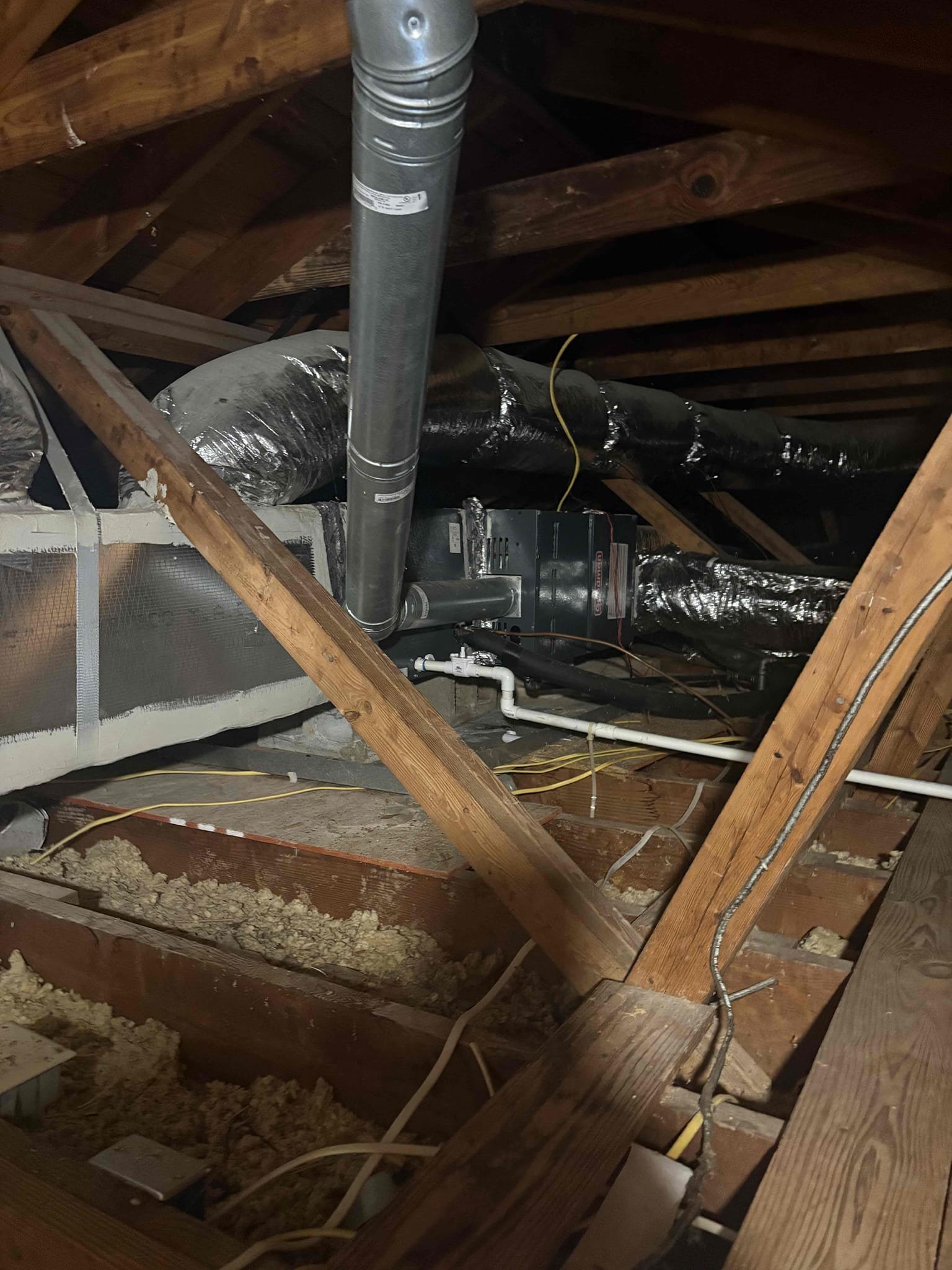 Diagnosed drain line in attic as requested by customer. Found condensation line from unit in attic running to the gutter outside. Not up to code. Recommended customer to call professional hvac company to address line and bring up to code