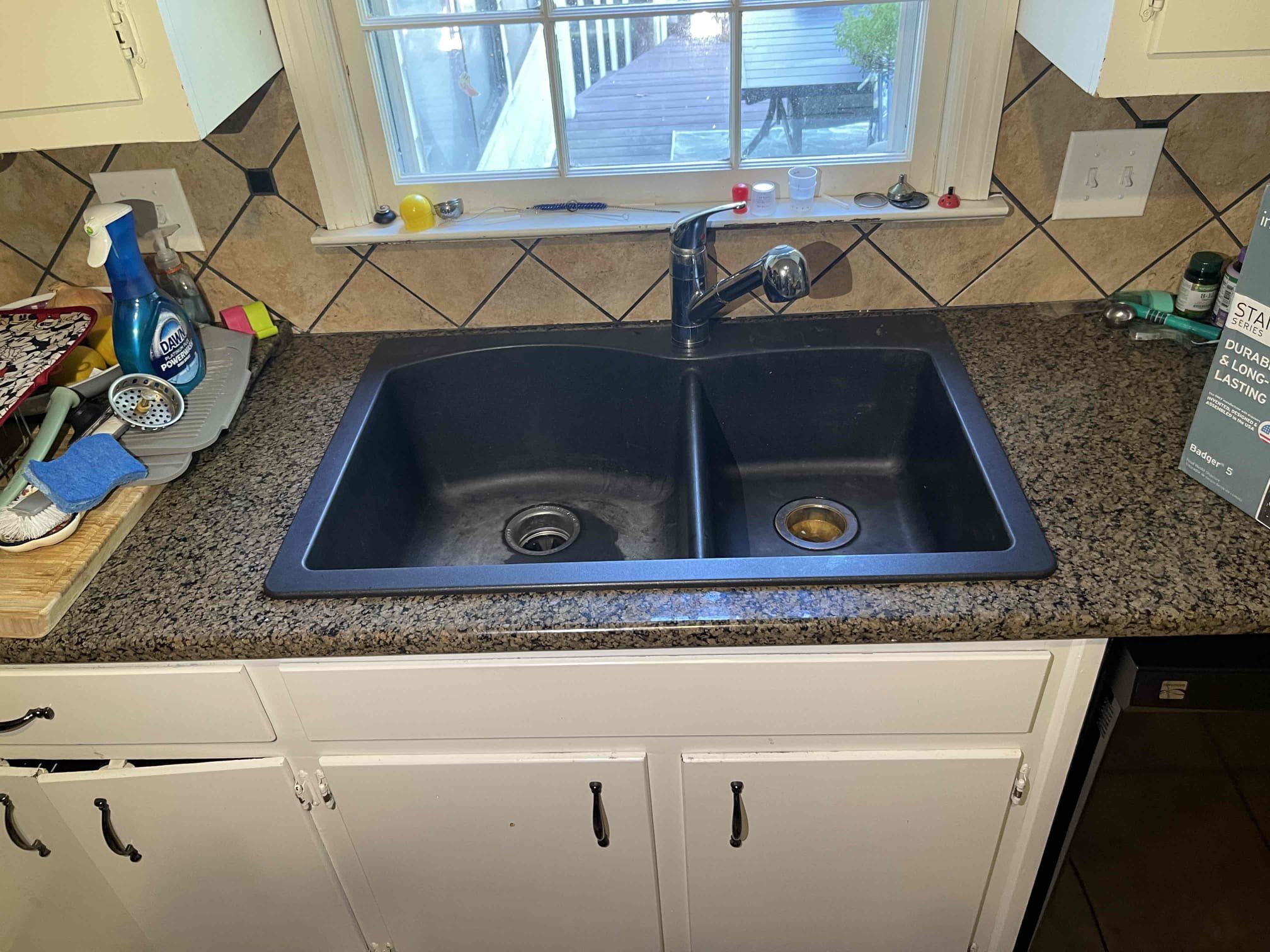 Returned and installed customer supplied kitchen sink, disposal, and faucet. Reworked the drain for the new orientation of the sink basins. No further issue at this time. Did courtesy rebuild of toilet in downstairs bathroom. 