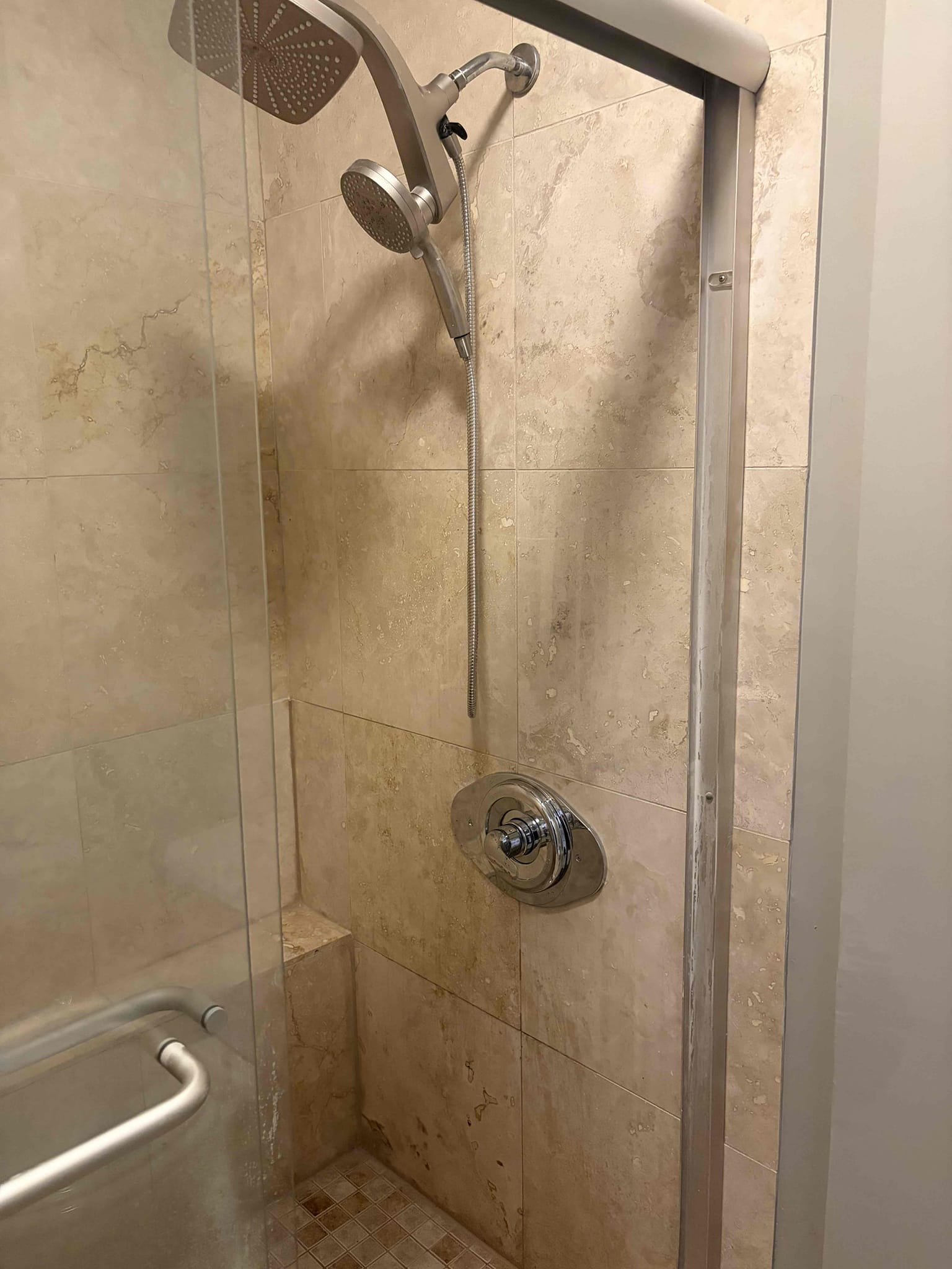 Upon arrival customer had a shower valve the was seized up and was hard to pull in and out and could not get old cartridge out. Called property manager gave them price to replace shower valve with cutting access in the front with tile. Customer approved estimate. Cut tile to create access from the front, installed new delta shower valve with rescuing plate. Also installed new trim kit. Tested system, System is working with no leaks upon departure.