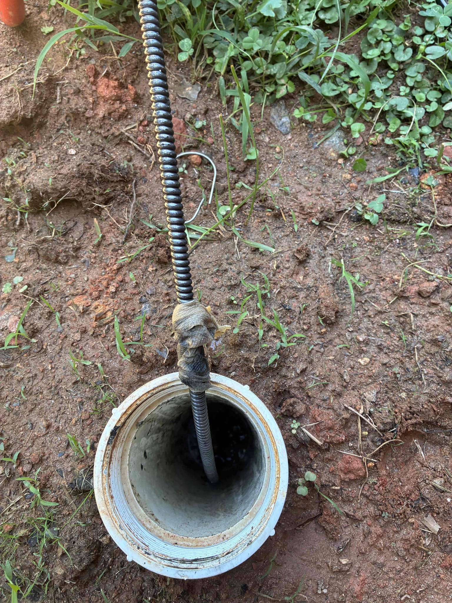 Snake drain to clear blockage. Pulled back wet wipes