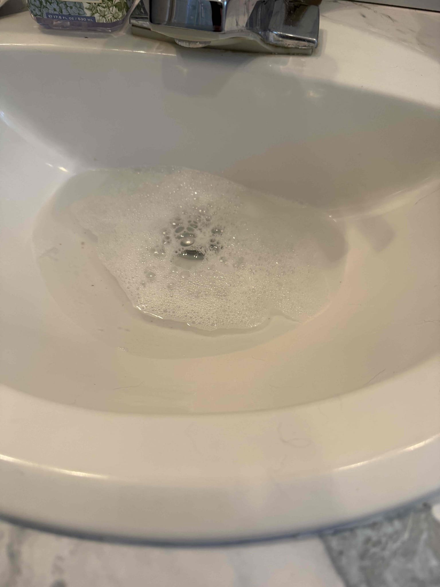 Vanity not draining upon arrival, customer stated her vanity drain is completely stopped up. After testing vanity informed customer we would need to run our small cable down the line to clear the blockage. Gave customer estimate, customer approved estimate. Ran small cable down the line and cleared the blockage, also cleaned p trap and pop up assembly. Filled sink up multiple times and let it drain to test for leaks and make sure it has proper flow. Sink is working properly and no leaks upon departure.