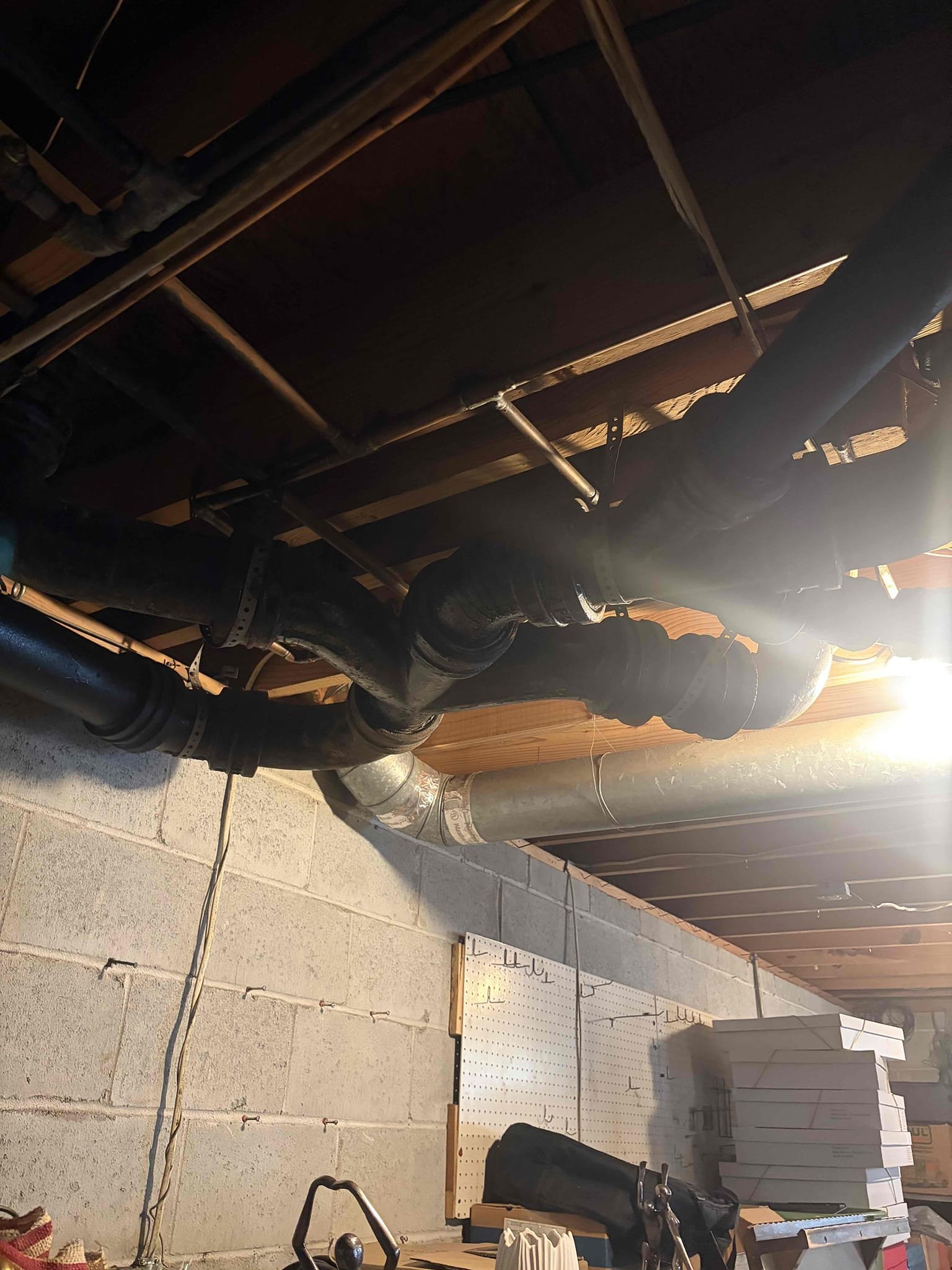 Upon arrival, customer stated she is experiencing a backup. After inspection, found clean out in basement. Pop clean out, clean out is not holding any water. Informed customer blockage is somewhere between cleanout and bathrooms. Informed customer I can run drain machine back through clean out and attempt to clear blockage. Customer approved estimate. Ran drain machine approximately 25 to 30 foot, cleared blockage. Blockage was caused by wet wipes. Also found leak coming from cast-iron combo wye, provided customer with estimate to re-pipe both bathrooms from cast-iron to PVC. Re-pipe will include two new closet flanges, tying onto existing tub and shower and vent and vanity. Customer signed up for Win With Chen!